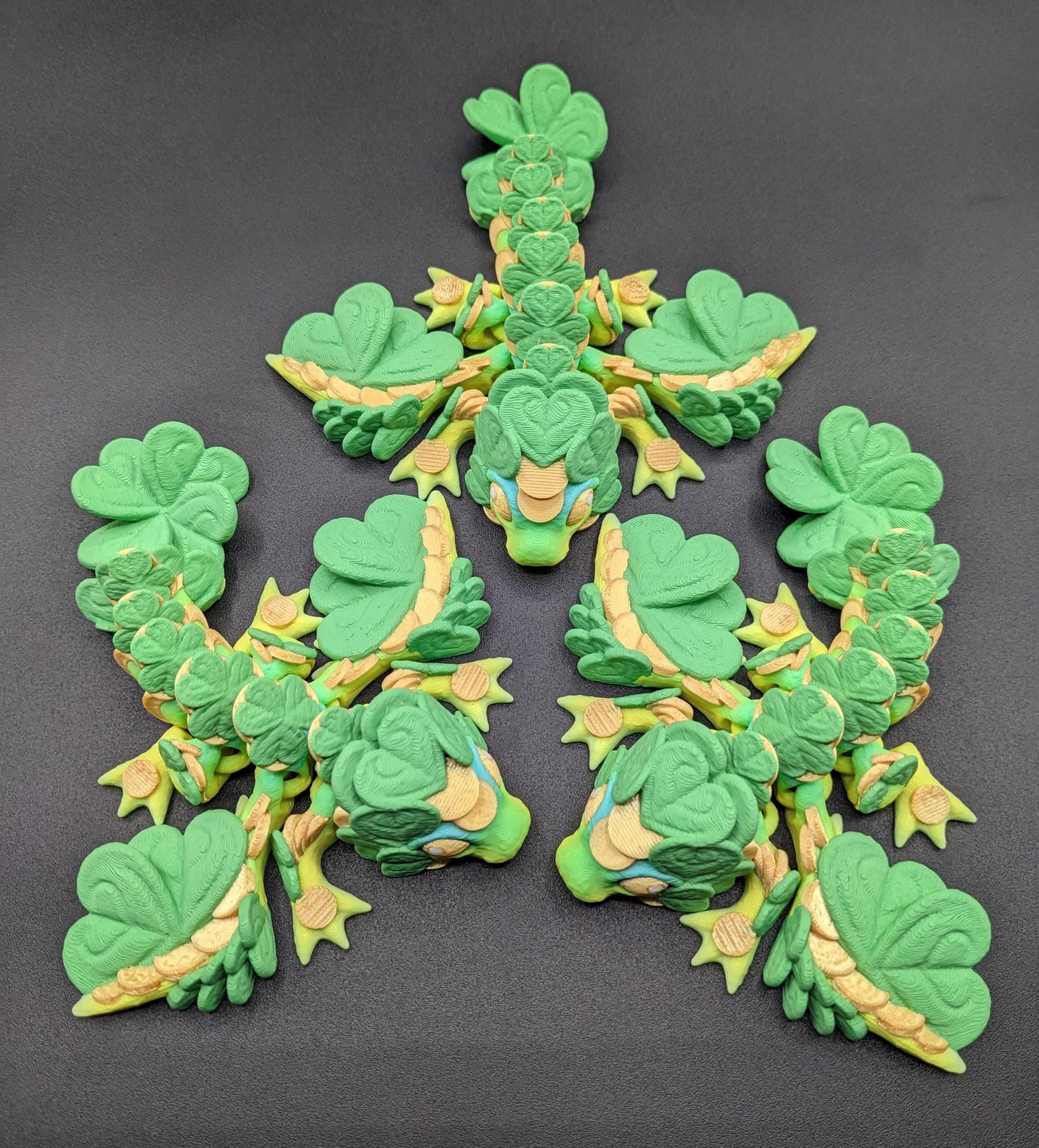 Meet our Adorable Tiny Baby Clover Dragon featuring intricate details & whimsical design, inspired by the luck & charm of clovers. Perfect for dragon enthusiasts or anyone who loves all things small. With the luck of the leprechaun, this little dragon is the perfect lucky charm. Small enough to carry in your pocket or display on desks, shelves, or computer.