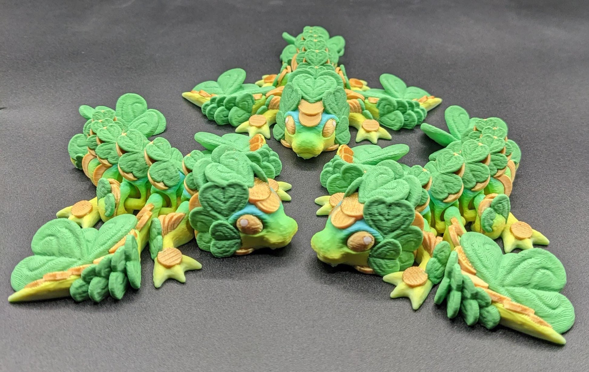 Meet our Adorable Tiny Baby Clover Dragon featuring intricate details & whimsical design, inspired by the luck & charm of clovers. Perfect for dragon enthusiasts or anyone who loves all things small. With the luck of the leprechaun, this little dragon is the perfect lucky charm. Small enough to carry in your pocket or display on desks, shelves, or computer.