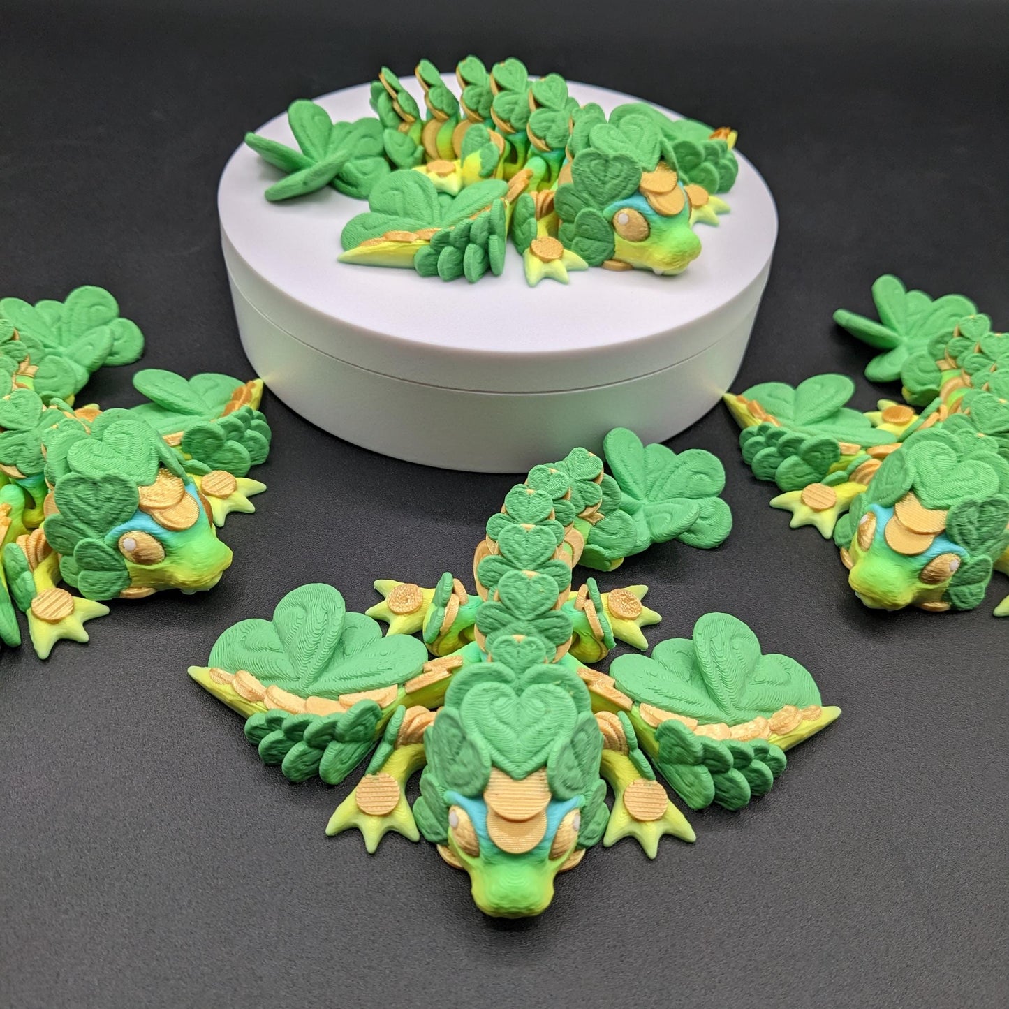 Meet our Adorable Tiny Baby Clover Dragon featuring intricate details & whimsical design, inspired by the luck & charm of clovers. Perfect for dragon enthusiasts or anyone who loves all things small. With the luck of the leprechaun, this little dragon is the perfect lucky charm. Small enough to carry in your pocket or display on desks, shelves, or computer.