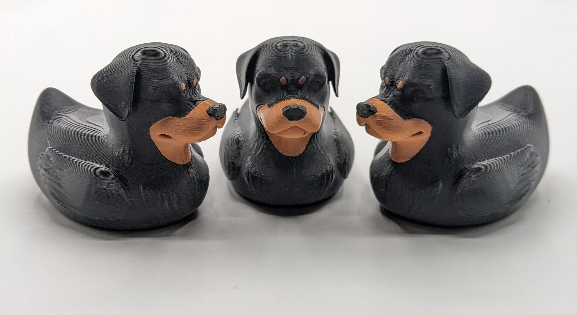 Introducing the Wonderful Rottweiler Dog Duck, a playful and unique 3D-printed creation that combines the strength and loyalty of a Rottweiler with the whimsical charm of a rubber duck! Perfect for Rottweiler enthusiasts, Jeep duck collectors, all duck collectors, or anyone who loves quirky and creative designs, this hybrid piece is sure to bring joy to your home or make the perfect gift for someone special.