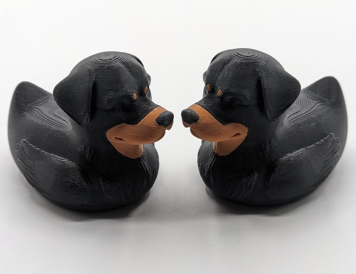 Introducing the Wonderful Rottweiler Dog Duck, a playful and unique 3D-printed creation that combines the strength and loyalty of a Rottweiler with the whimsical charm of a rubber duck! Perfect for Rottweiler enthusiasts, Jeep duck collectors, all duck collectors, or anyone who loves quirky and creative designs, this hybrid piece is sure to bring joy to your home or make the perfect gift for someone special.