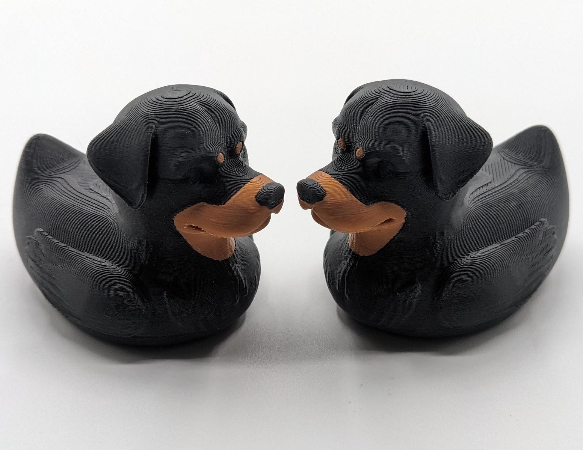 Introducing the Wonderful Rottweiler Dog Duck, a playful and unique 3D-printed creation that combines the strength and loyalty of a Rottweiler with the whimsical charm of a rubber duck! Perfect for Rottweiler enthusiasts, Jeep duck collectors, all duck collectors, or anyone who loves quirky and creative designs, this hybrid piece is sure to bring joy to your home or make the perfect gift for someone special.