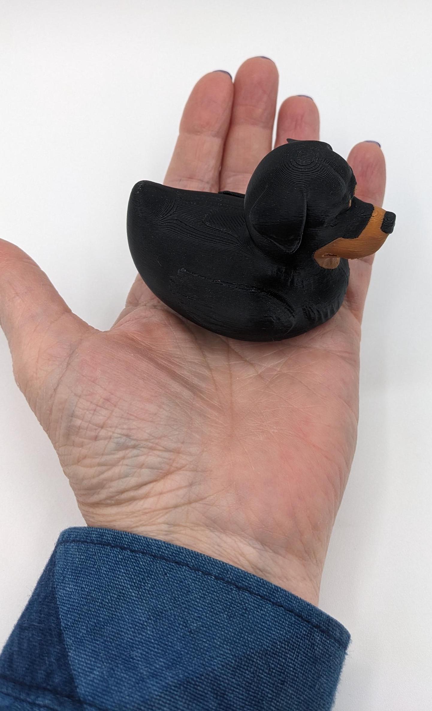 Introducing the Wonderful Rottweiler Dog Duck, a playful and unique 3D-printed creation that combines the strength and loyalty of a Rottweiler with the whimsical charm of a rubber duck! Perfect for Rottweiler enthusiasts, Jeep duck collectors, all duck collectors, or anyone who loves quirky and creative designs, this hybrid piece is sure to bring joy to your home or make the perfect gift for someone special.