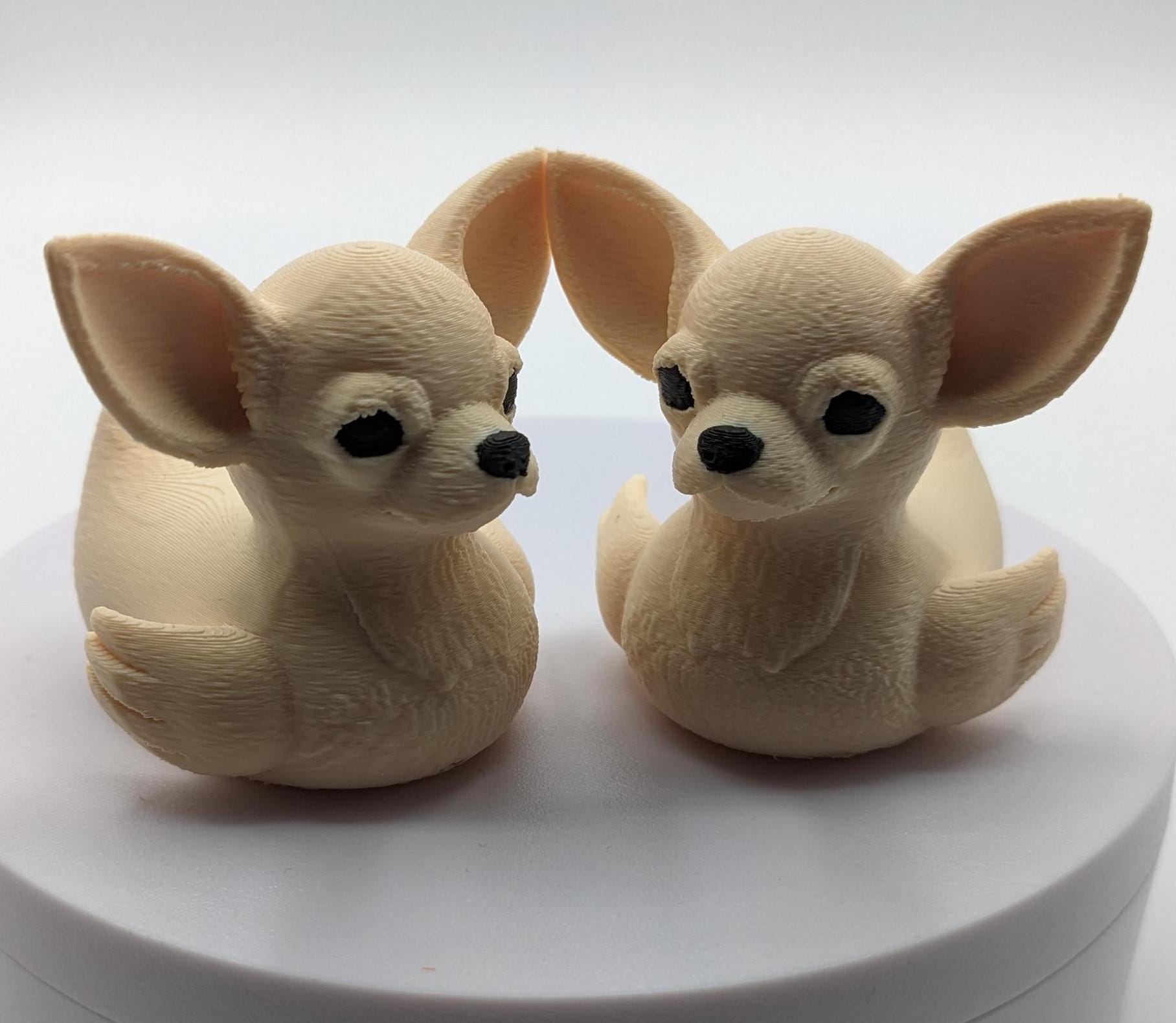 Meet the Cute Chihuahua Duck, a delightful and quirky 3D-printed hybrid figurine that combines the sassy charm of a Chihuahua with the playful personality of a duck! This adorable design is perfect for dog lovers, Chihuahua fans, Jeep duck collectors, or anyone who loves unique and creative decor. Whether perched on your desk, Jeep dash, displayed on a shelf, or given as a memorable gift, this Chihuahua Duck is guaranteed to bring joy and start conversations.
