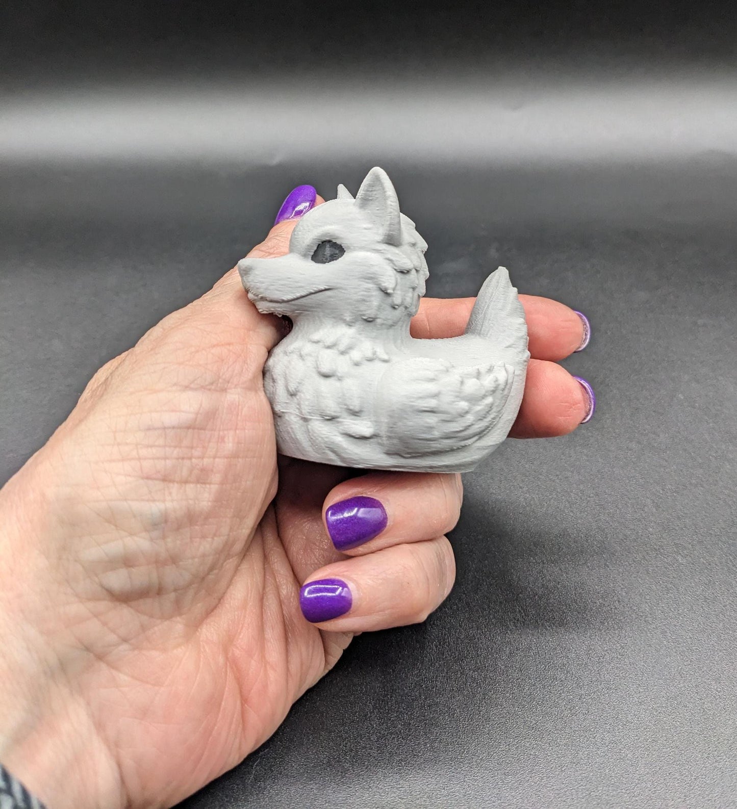 Meet our newest member of our duck family, the Gray Wolf Duck! Whether you’re a fan of wolves, ducks, Jeep Duck Collector, or quirky decor, this hybrid figurine is the ultimate conversation starter. Designed with intricate details makes this loyal and unique creation makes the perfect gift for animal lovers, Jeep duck collectors, or anyone who appreciates imaginative designs.
