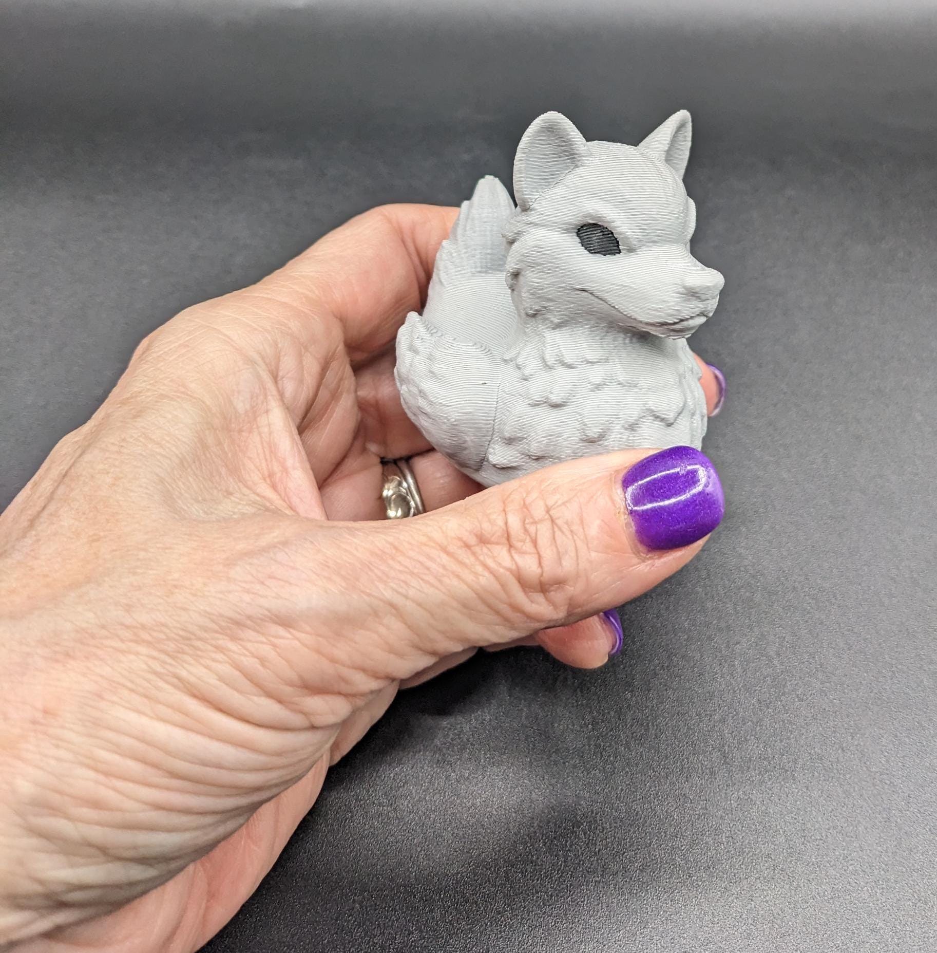Meet our newest member of our duck family, the Gray Wolf Duck! Whether you’re a fan of wolves, ducks, Jeep Duck Collector, or quirky decor, this hybrid figurine is the ultimate conversation starter. Designed with intricate details makes this loyal and unique creation makes the perfect gift for animal lovers, Jeep duck collectors, or anyone who appreciates imaginative designs.