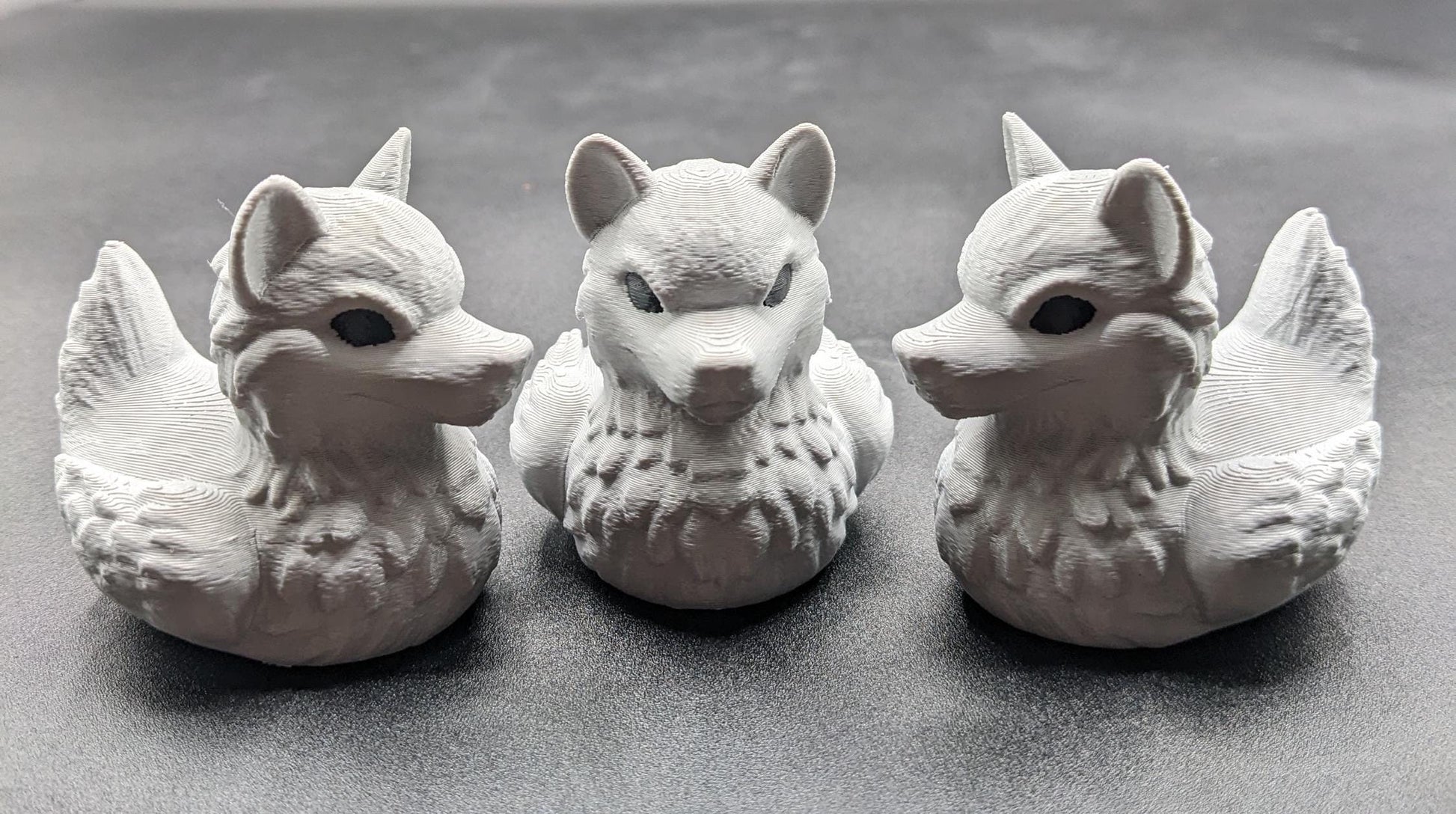 Meet our newest member of our duck family, the Gray Wolf Duck! Whether you’re a fan of wolves, ducks, Jeep Duck Collector, or quirky decor, this hybrid figurine is the ultimate conversation starter. Designed with intricate details makes this loyal and unique creation makes the perfect gift for animal lovers, Jeep duck collectors, or anyone who appreciates imaginative designs.