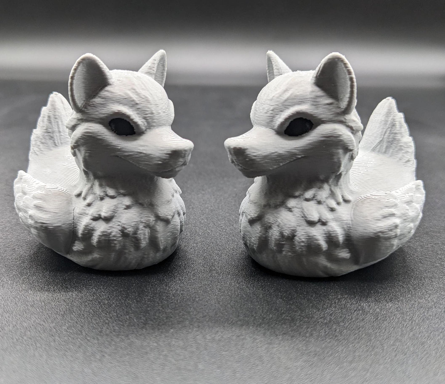 Meet our newest member of our duck family, the Gray Wolf Duck! Whether you’re a fan of wolves, ducks, Jeep Duck Collector, or quirky decor, this hybrid figurine is the ultimate conversation starter. Designed with intricate details makes this loyal and unique creation makes the perfect gift for animal lovers, Jeep duck collectors, or anyone who appreciates imaginative designs.