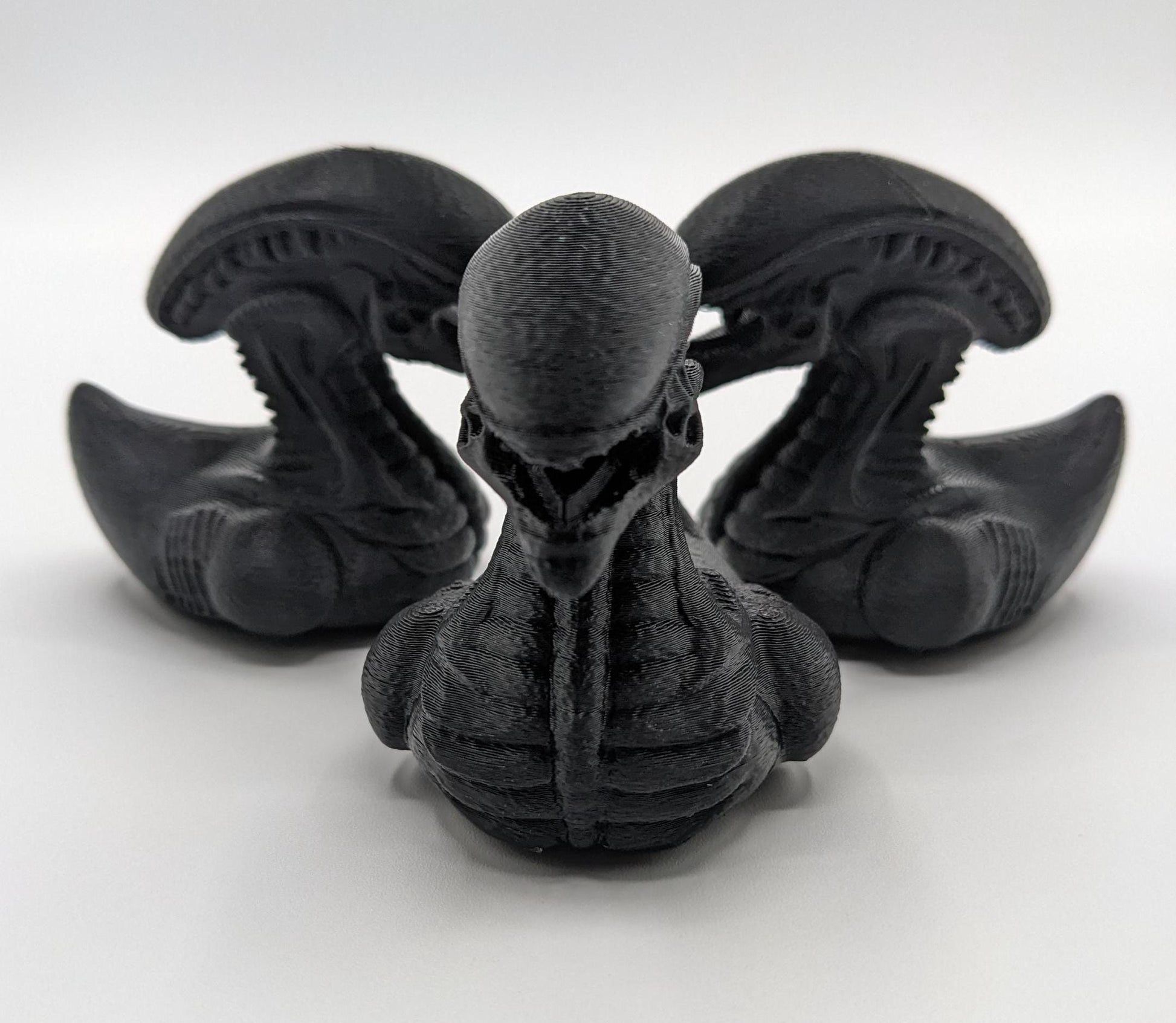 Step into the world of sci-fi and whimsy with the Alien Xenomorph Duck! This one-of-a-kind 3D-printed creation combines the eerie, iconic design of an alien xenomorph with the playful charm of a duck. Perfect for fans of alien creatures, sci-fi enthusiasts, Jeep duck collectors, or anyone who loves quirky collectibles, this hybrid figurine is sure to stand out in any collection.