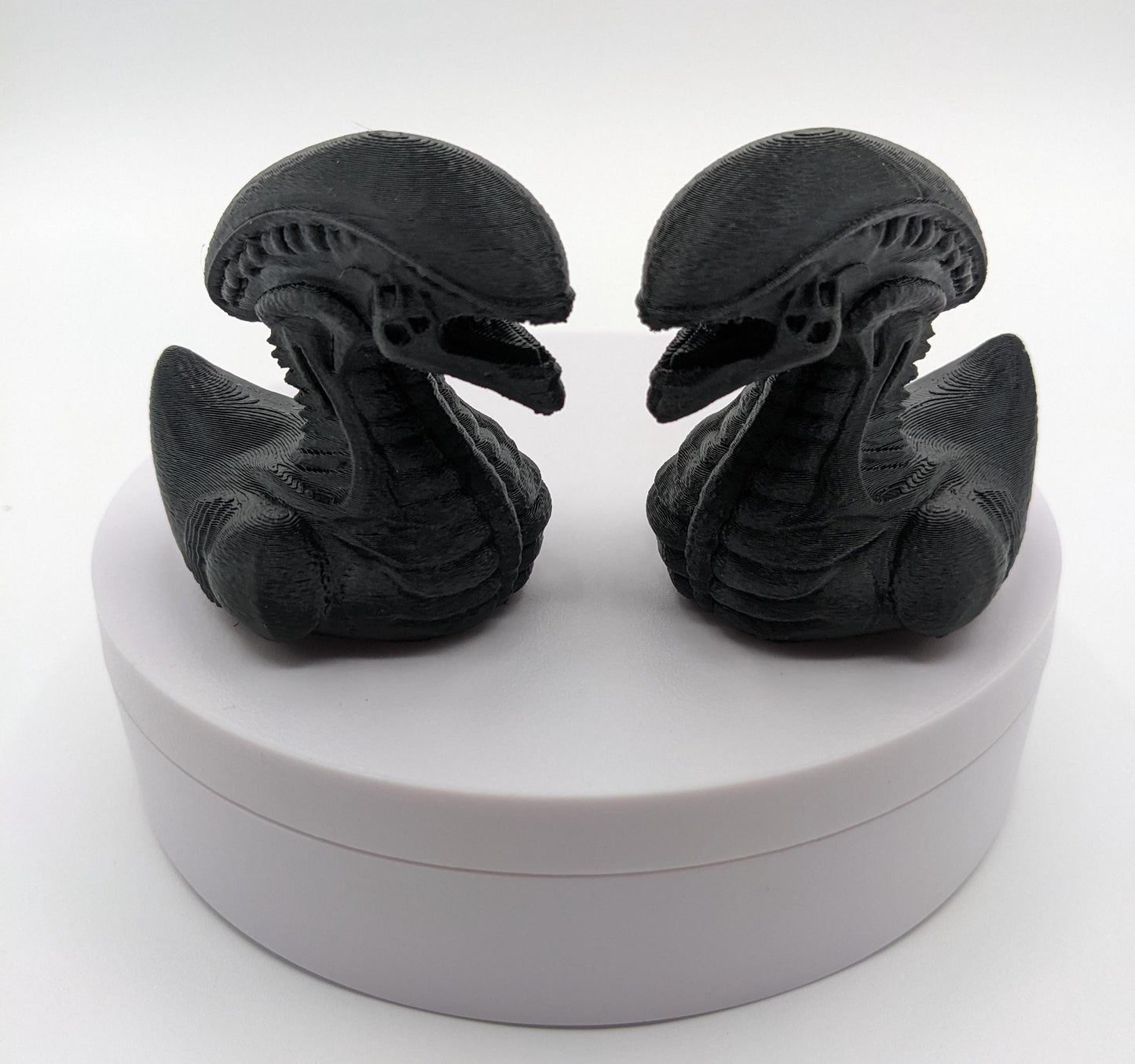 Step into the world of sci-fi and whimsy with the Alien Xenomorph Duck! This one-of-a-kind 3D-printed creation combines the eerie, iconic design of an alien xenomorph with the playful charm of a duck. Perfect for fans of alien creatures, sci-fi enthusiasts, Jeep duck collectors, or anyone who loves quirky collectibles, this hybrid figurine is sure to stand out in any collection.
