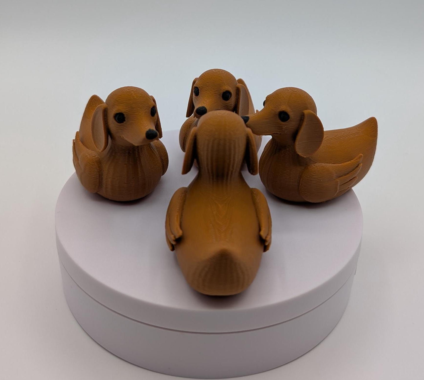 Say hello to the Adorable Dachshund Wiener Dog Duck, a quirky and lovable 3D-printed hybrid that combines the long-bodied charm of a dachshund with the playful personality of a duck. This whimsical design is perfect for dog lovers, dachshund enthusiasts, Jeep duck collectors, or anyone who enjoys unique and creative collectibles.