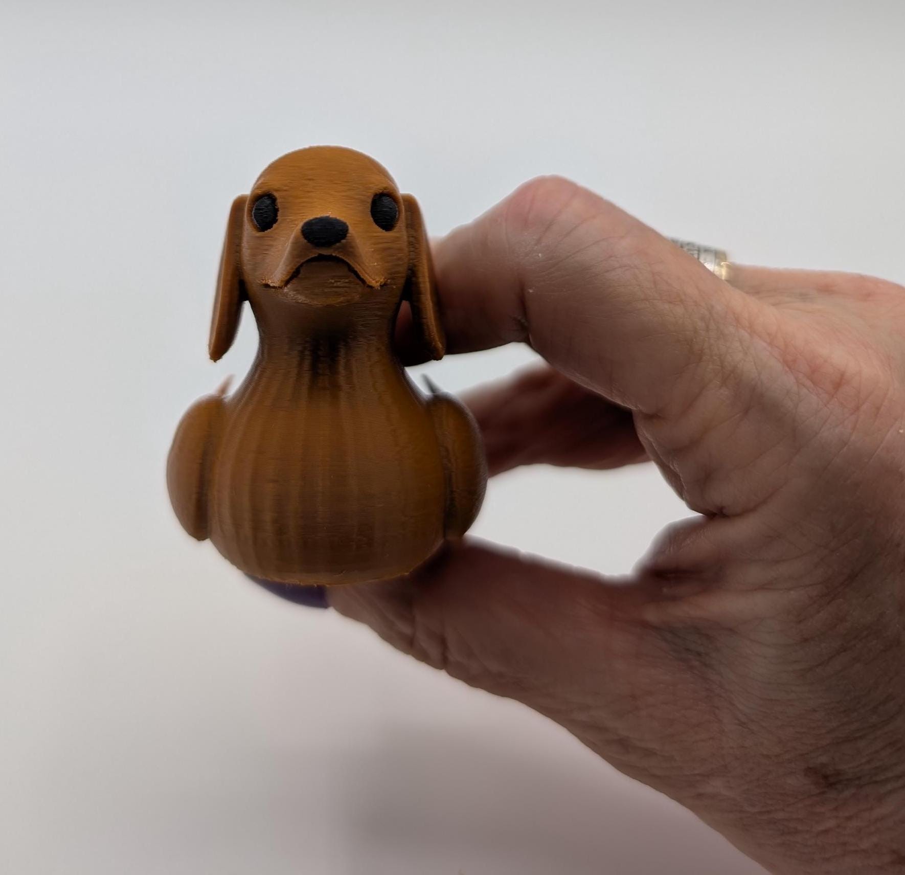 Say hello to the Adorable Dachshund Wiener Dog Duck, a quirky and lovable 3D-printed hybrid that combines the long-bodied charm of a dachshund with the playful personality of a duck. This whimsical design is perfect for dog lovers, dachshund enthusiasts, Jeep duck collectors, or anyone who enjoys unique and creative collectibles.
