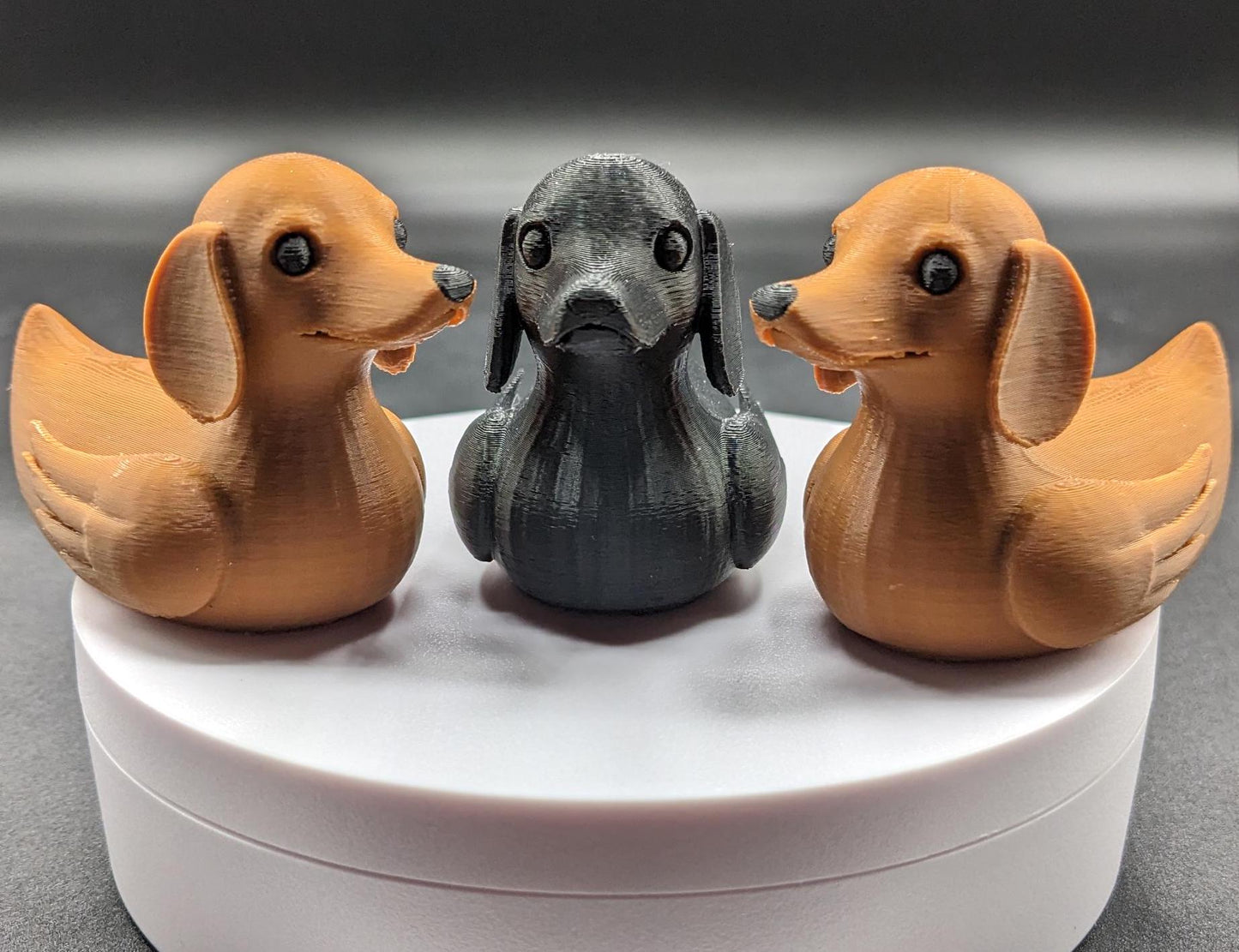 Say hello to the Adorable Dachshund Wiener Dog Duck, a quirky and lovable 3D-printed hybrid that combines the long-bodied charm of a dachshund with the playful personality of a duck. This whimsical design is perfect for dog lovers, dachshund enthusiasts, Jeep duck collectors, or anyone who enjoys unique and creative collectibles.