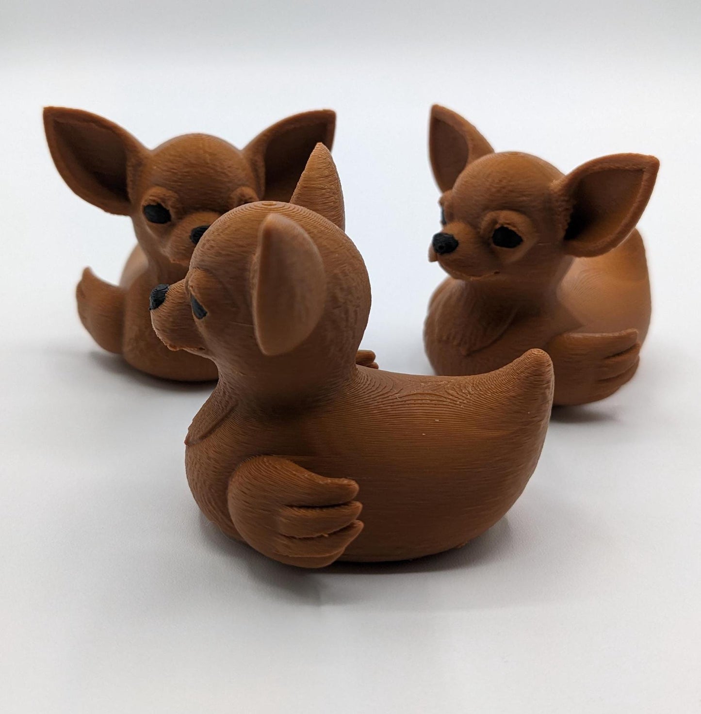 Meet the Cute Chihuahua Duck, a delightful and quirky 3D-printed hybrid figurine that combines the sassy charm of a Chihuahua with the playful personality of a duck! This adorable design is perfect for dog lovers, Chihuahua fans, Jeep duck collectors, or anyone who loves unique and creative decor. Whether perched on your desk, Jeep dash, displayed on a shelf, or given as a memorable gift, this Chihuahua Duck is guaranteed to bring joy and start conversations.