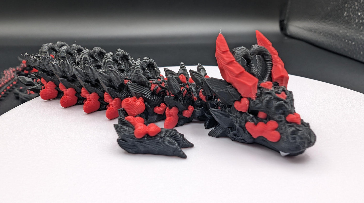 Discover the magic of our Valentine Heart Dragon! This enchanting articulating dragon not only graces your bookshelf with whimsy but also makes for a heartfelt and unforgettable Valentine's Day gift. Elevate your space with love!