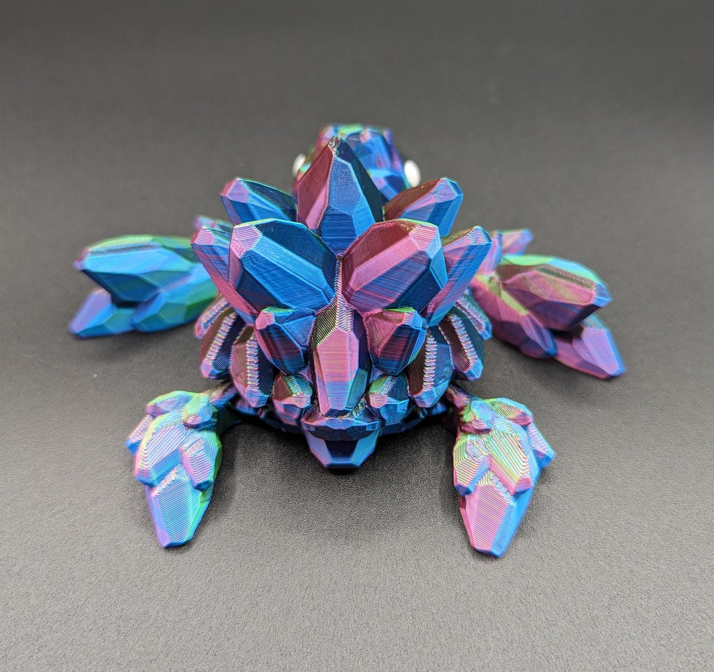 Welcome to our enchanting world of 3D Printed Gemstone Turtles! Elevate your home decor with this exquisite handcrafted sculpture that seamlessly blends artistry with nature's beauty. Our unique turtle design captures the essence of tranquility, making it a perfect addition to any space.