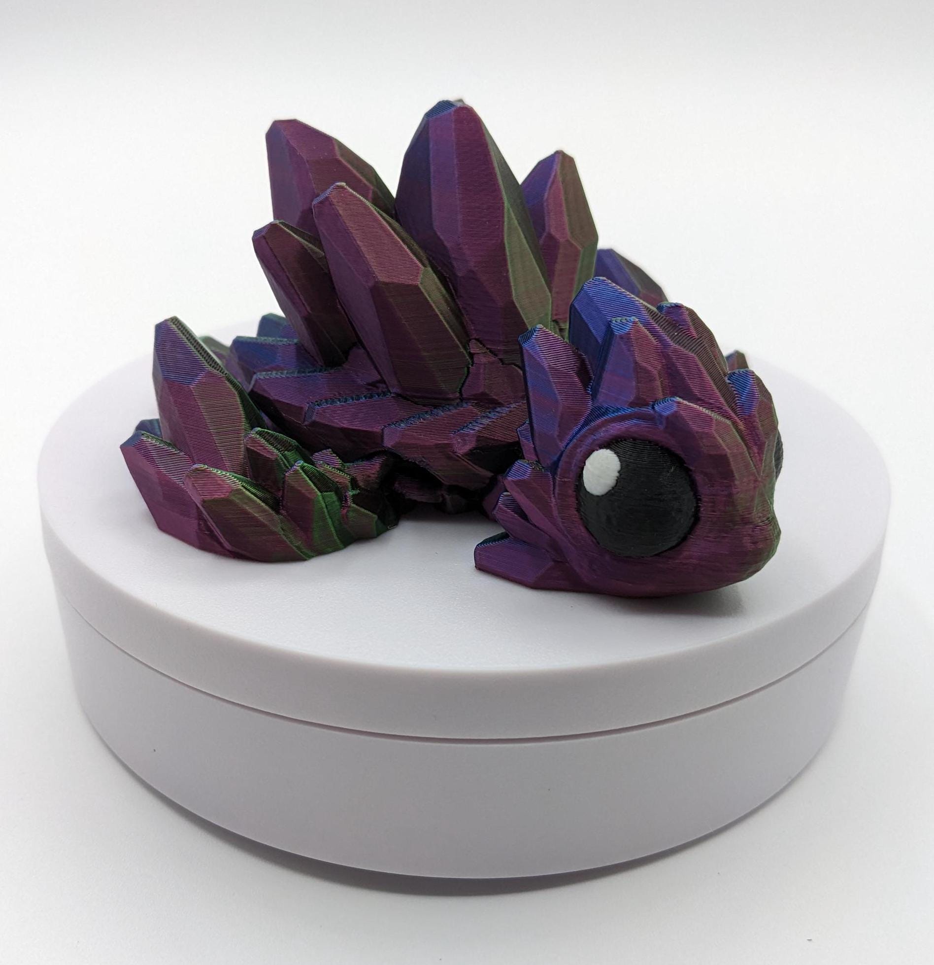 Welcome to our enchanting world of 3D Printed Gemstone Turtles! Elevate your home decor with this exquisite handcrafted sculpture that seamlessly blends artistry with nature's beauty. Our unique turtle design captures the essence of tranquility, making it a perfect addition to any space.
