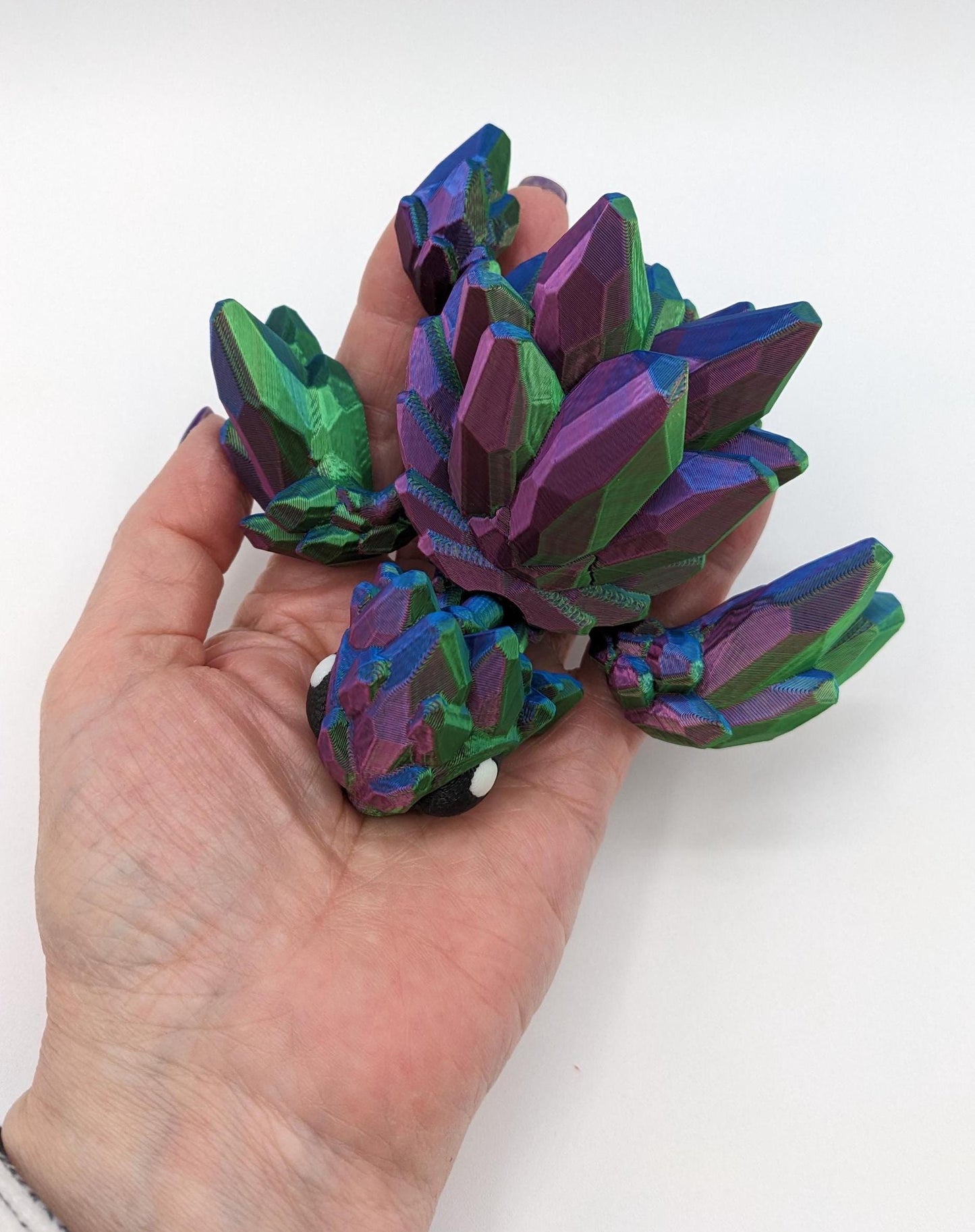 Welcome to our enchanting world of 3D Printed Gemstone Turtles! Elevate your home decor with this exquisite handcrafted sculpture that seamlessly blends artistry with nature's beauty. Our unique turtle design captures the essence of tranquility, making it a perfect addition to any space.