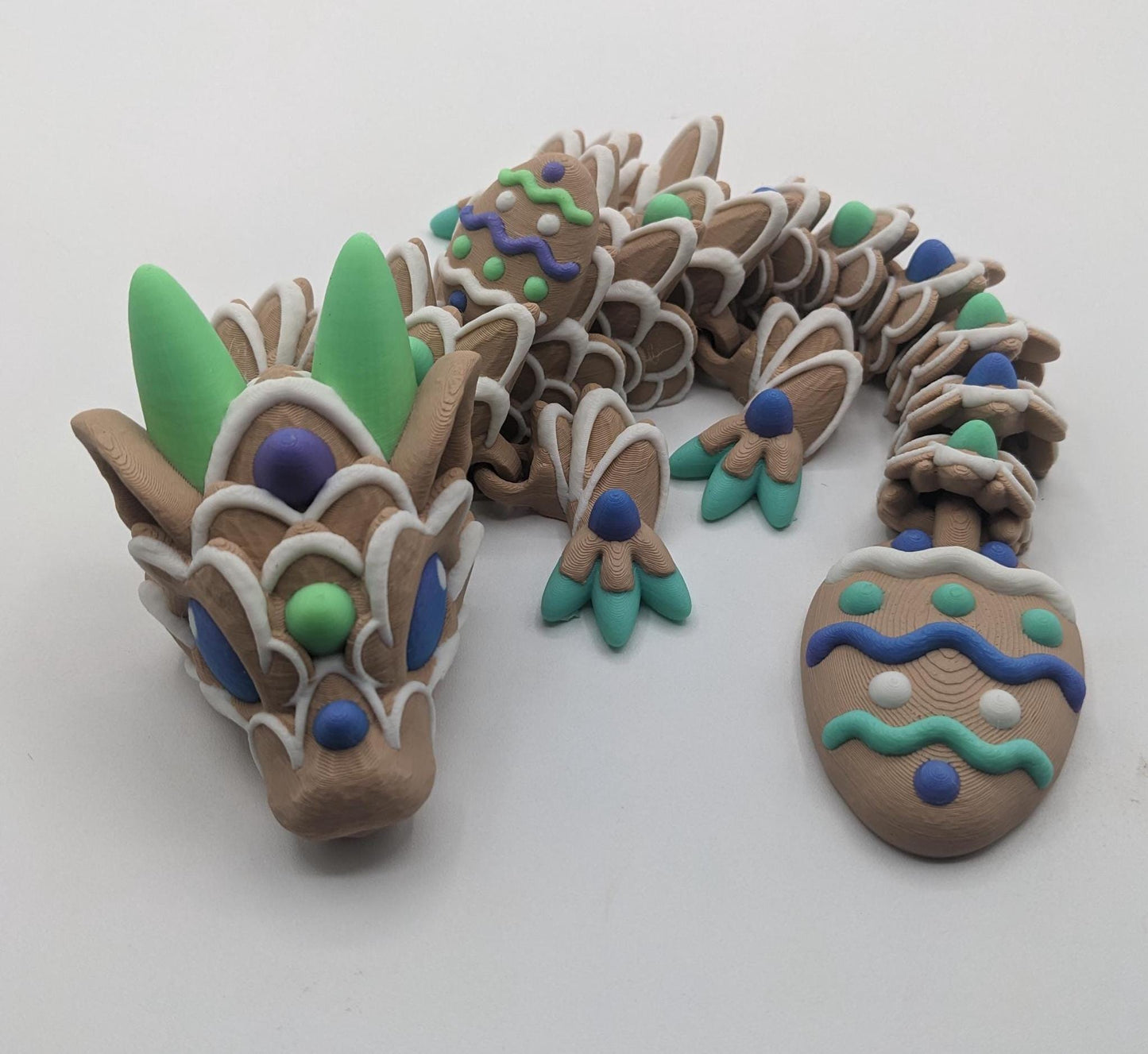 Add a touch of magic and festivity to your Easter celebration with The Beautiful Easter Egg Cookie Dragon! Whether you’re looking for a unique seasonal decor piece, a thoughtful gift, or a whimsical addition to your fantasy collection, this dragon is sure to make a statement. Compact, durable, and eco-friendly, it’s the perfect way to celebrate spring in style.