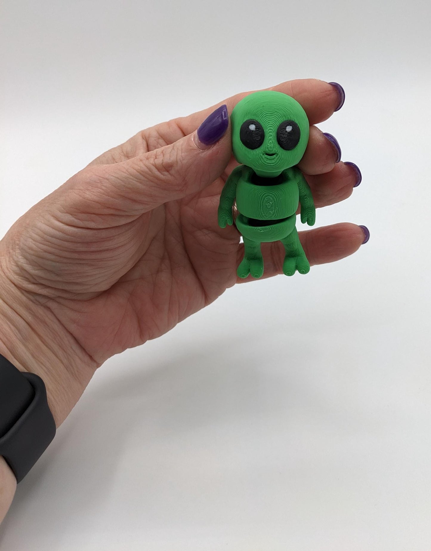 Say hello to the Tiny Alien Fidget Toy, a fun and quirky companion thatâs out of this world! This 3D-printed alien is designed for fidgeting, stress relief, and endless entertainment. Its compact size makes it perfect to carry in your pocket, and its unique design is sure to spark smiles wherever you go. Whether youâre looking for a fun desk toy, a creative gift, or a unique collectible, this tiny alien is a must-have!