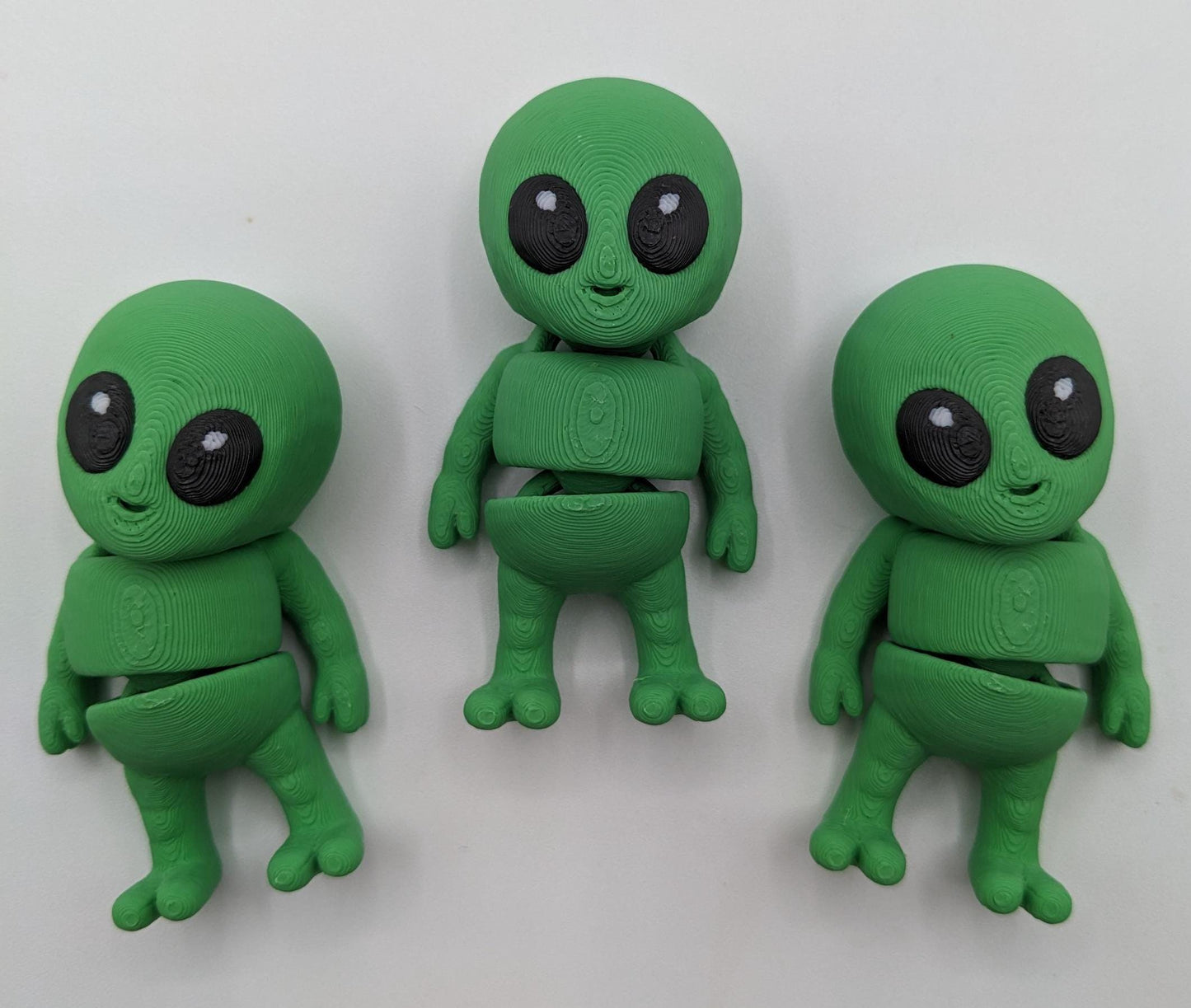 Say hello to the Tiny Alien Fidget Toy, a fun and quirky companion thatâs out of this world! This 3D-printed alien is designed for fidgeting, stress relief, and endless entertainment. Its compact size makes it perfect to carry in your pocket, and its unique design is sure to spark smiles wherever you go. Whether youâre looking for a fun desk toy, a creative gift, or a unique collectible, this tiny alien is a must-have!