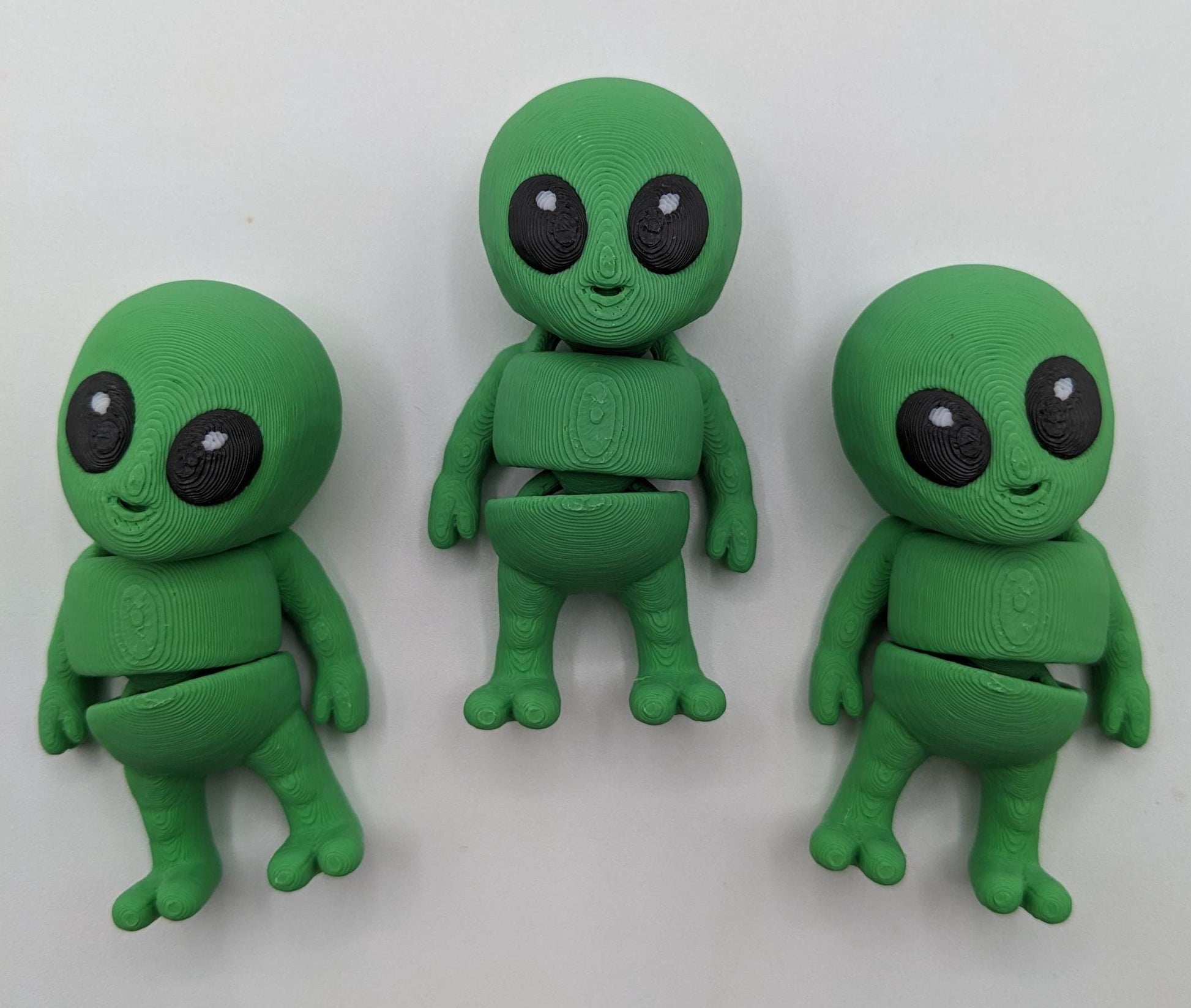 Say hello to the Tiny Alien Fidget Toy, a fun and quirky companion thatâs out of this world! This 3D-printed alien is designed for fidgeting, stress relief, and endless entertainment. Its compact size makes it perfect to carry in your pocket, and its unique design is sure to spark smiles wherever you go. Whether youâre looking for a fun desk toy, a creative gift, or a unique collectible, this tiny alien is a must-have!