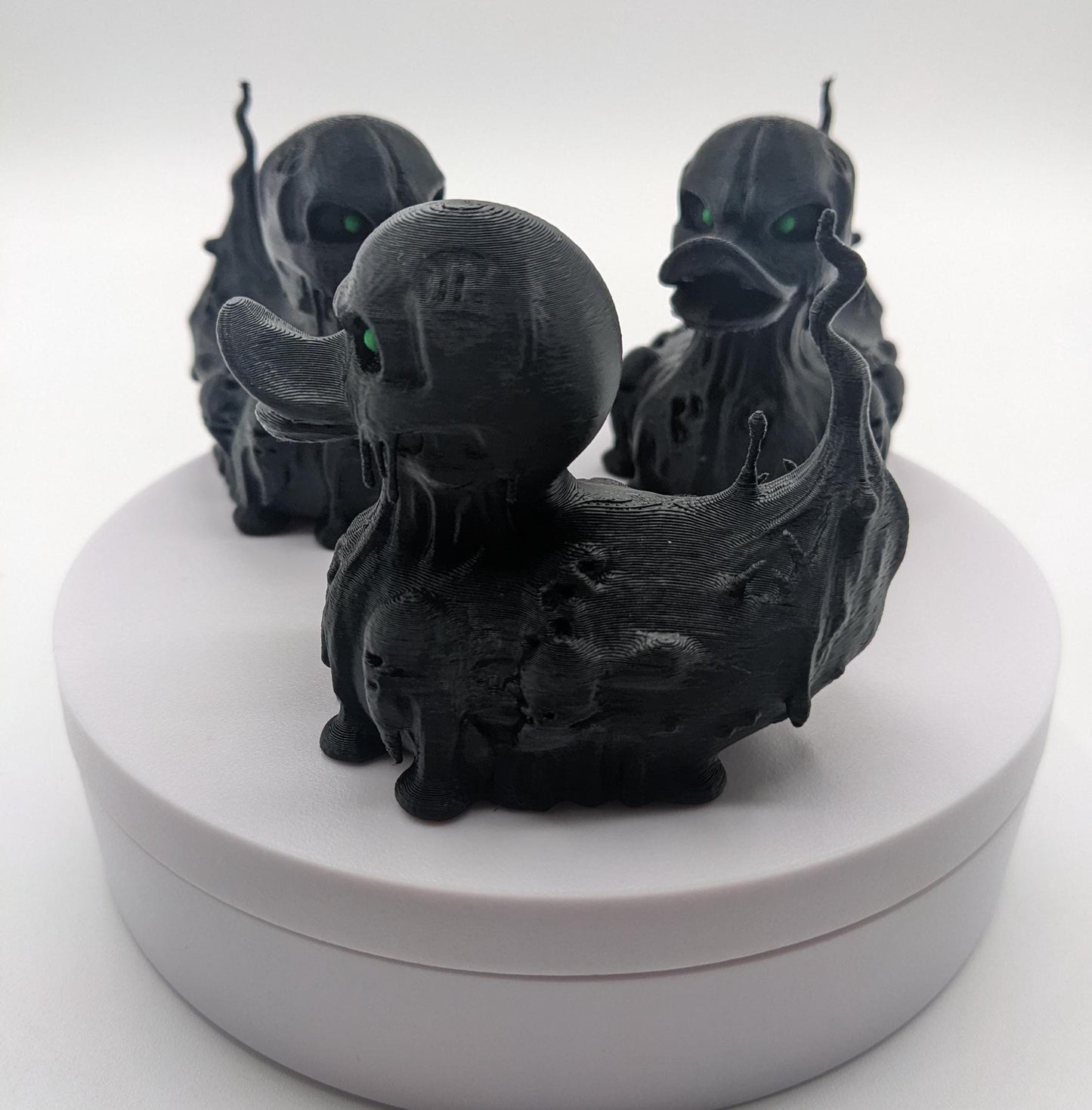 Meet our Scary Evil Spirit Duck, a spooky, quirky 3D-printed, (not painted), creation combining a classic duck with a haunting twist. It's creepy design & eerie features, this duck is perfect for Halloween decor, horror enthusiasts, Jeep duck collectors, or anyone who loves  spooky collectibles. Whether displayed on the dash of your Jeep, perched on your shelf, added to your haunted decorations, or gifted to a lover of the macabre, this evil spirit duck is guaranteed to make a scary statement!
