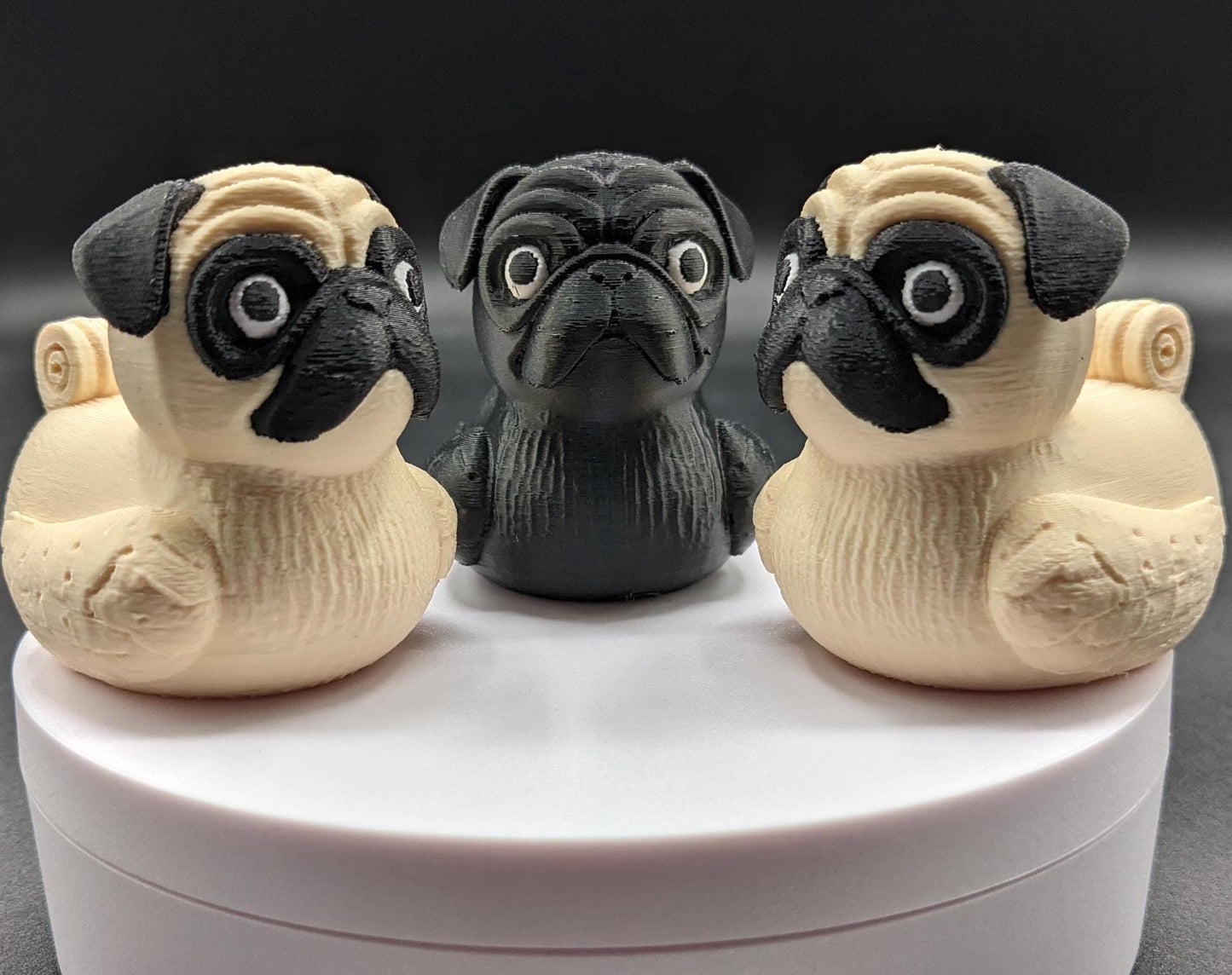 Meet The Fabulous Pug Dog Duck, a delightful 3D-printed creation that combines the charm of a pug with the whimsy of a rubber duck! This quirky and adorable design is perfect for pug lovers, Jeep duck collectors, duck enthusiasts, or anyone who enjoys playful and unique decor. Whether it’s displayed on a shelf, on the dash of your car, used as a conversation starter, or gifted to a dog or Jeep lover, this pug duck is guaranteed to bring smiles and laughter.