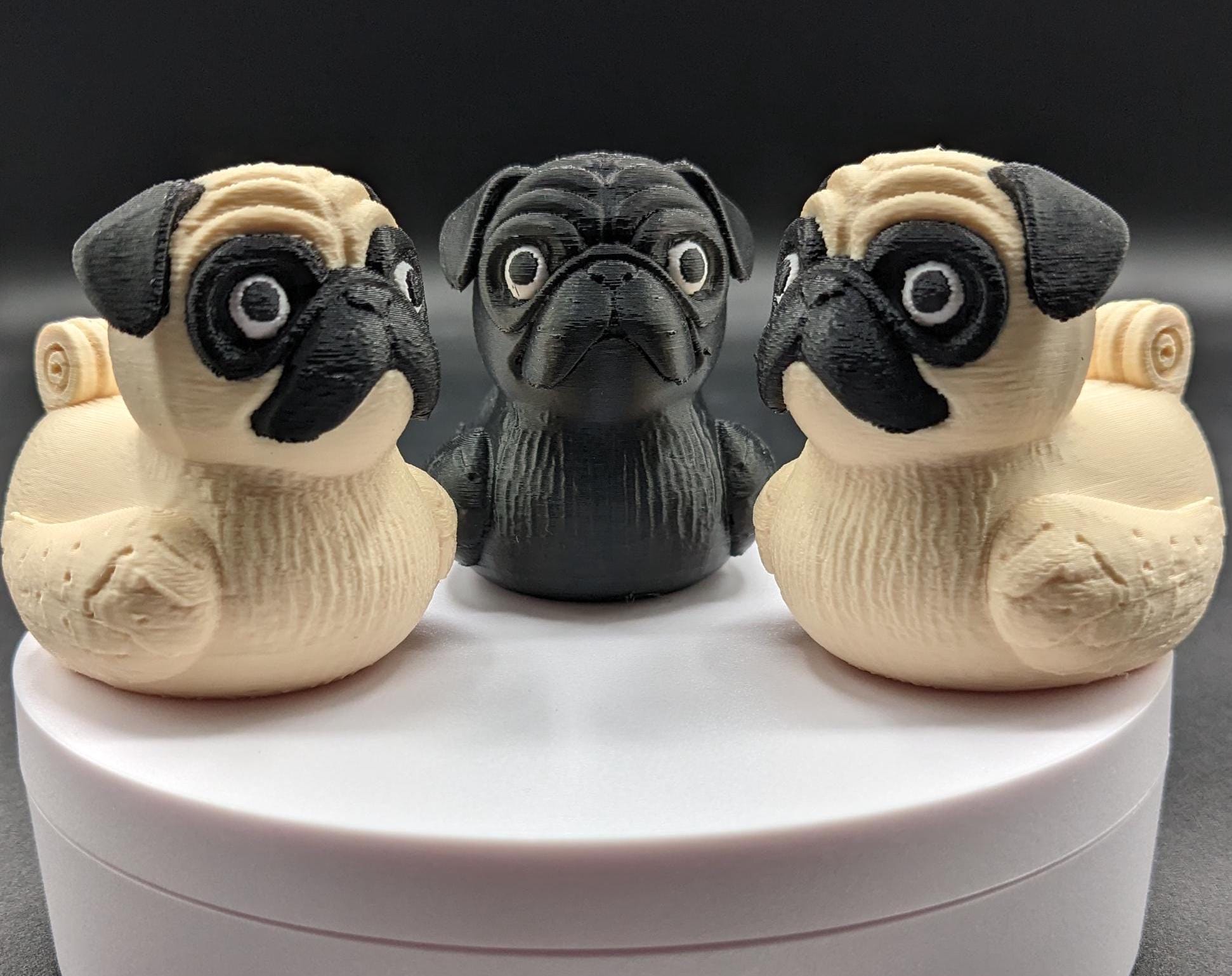 Meet The Fabulous Pug Dog Duck, a delightful 3D-printed creation that combines the charm of a pug with the whimsy of a rubber duck! This quirky and adorable design is perfect for pug lovers, Jeep duck collectors, duck enthusiasts, or anyone who enjoys playful and unique decor. Whether it’s displayed on a shelf, on the dash of your car, used as a conversation starter, or gifted to a dog or Jeep lover, this pug duck is guaranteed to bring smiles and laughter.