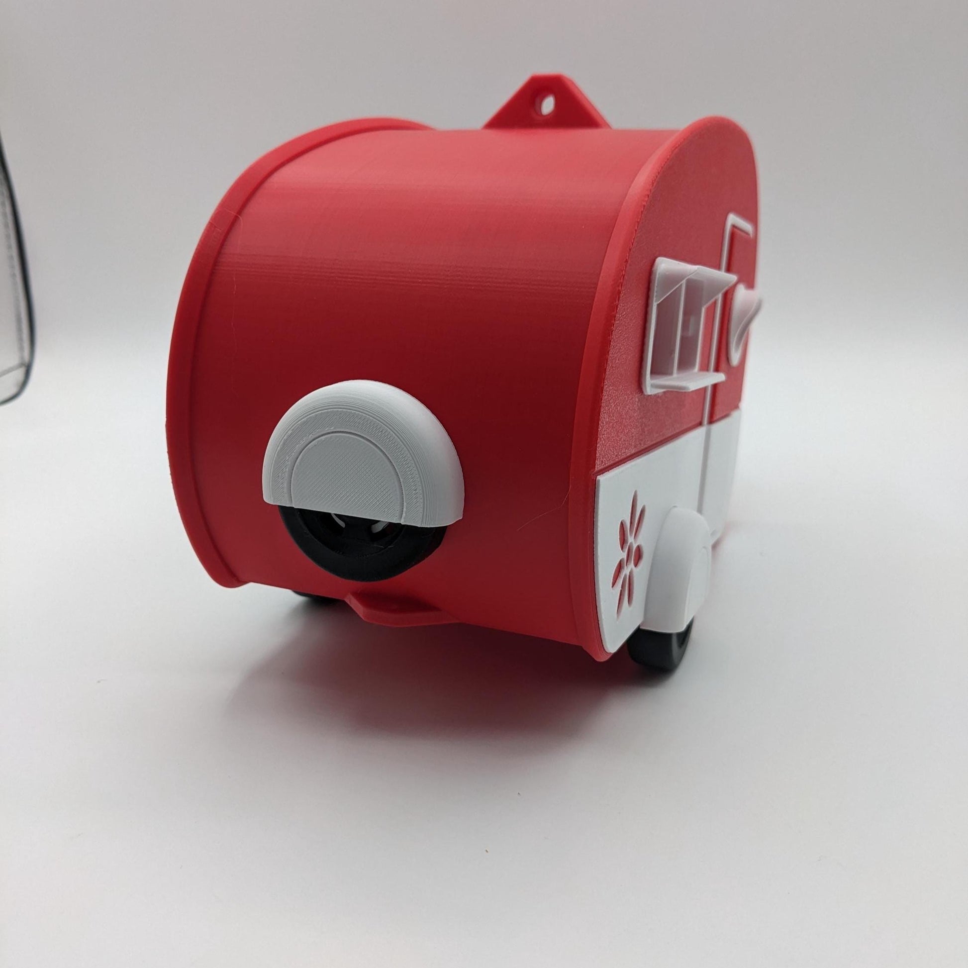 Turn your backyard into a bird lover’s paradise with the Retro RV Caravan Birdhouse! This charming and unique 3D-printed birdhouse is designed to look like a retro camper, bringing a touch of nostalgia and whimsy to your outdoor space. Perfect for bird enthusiasts, RV lovers, or anyone who adores fun and creative decor, this birdhouse is both functional and stylish.