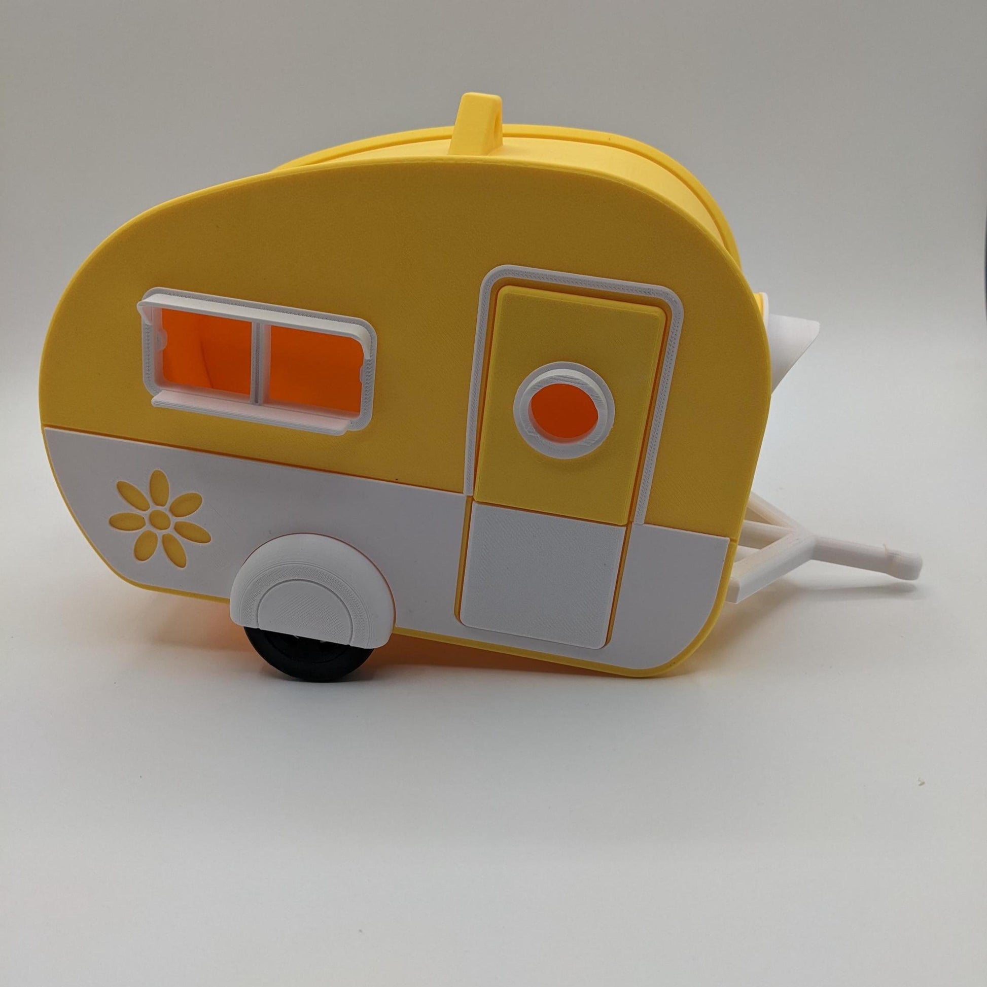 Turn your backyard into a bird lover’s paradise with the Retro RV Caravan Birdhouse! This charming and unique 3D-printed birdhouse is designed to look like a retro camper, bringing a touch of nostalgia and whimsy to your outdoor space. Perfect for bird enthusiasts, RV lovers, or anyone who adores fun and creative decor, this birdhouse is both functional and stylish.