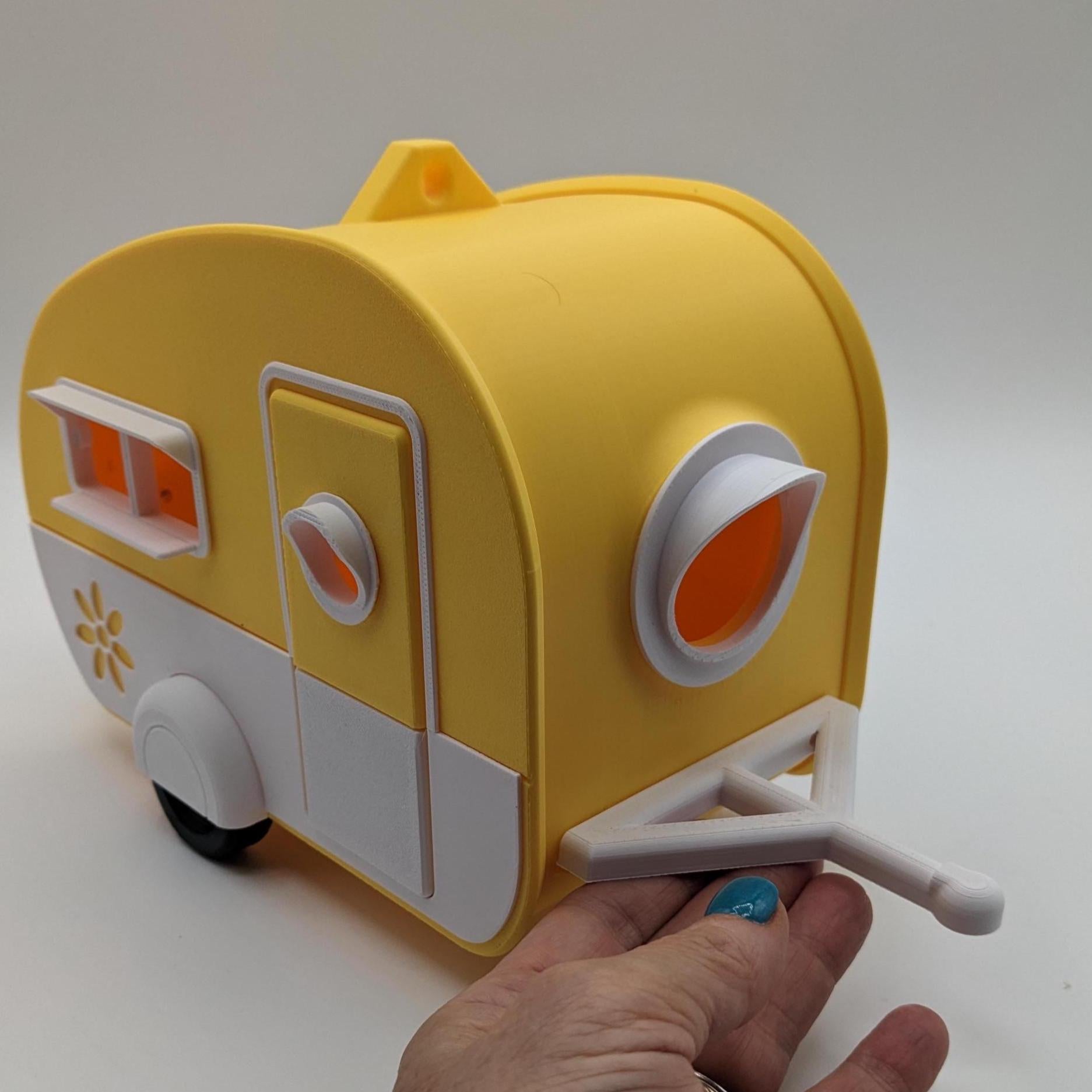 Turn your backyard into a bird lover’s paradise with the Retro RV Caravan Birdhouse! This charming and unique 3D-printed birdhouse is designed to look like a retro camper, bringing a touch of nostalgia and whimsy to your outdoor space. Perfect for bird enthusiasts, RV lovers, or anyone who adores fun and creative decor, this birdhouse is both functional and stylish.