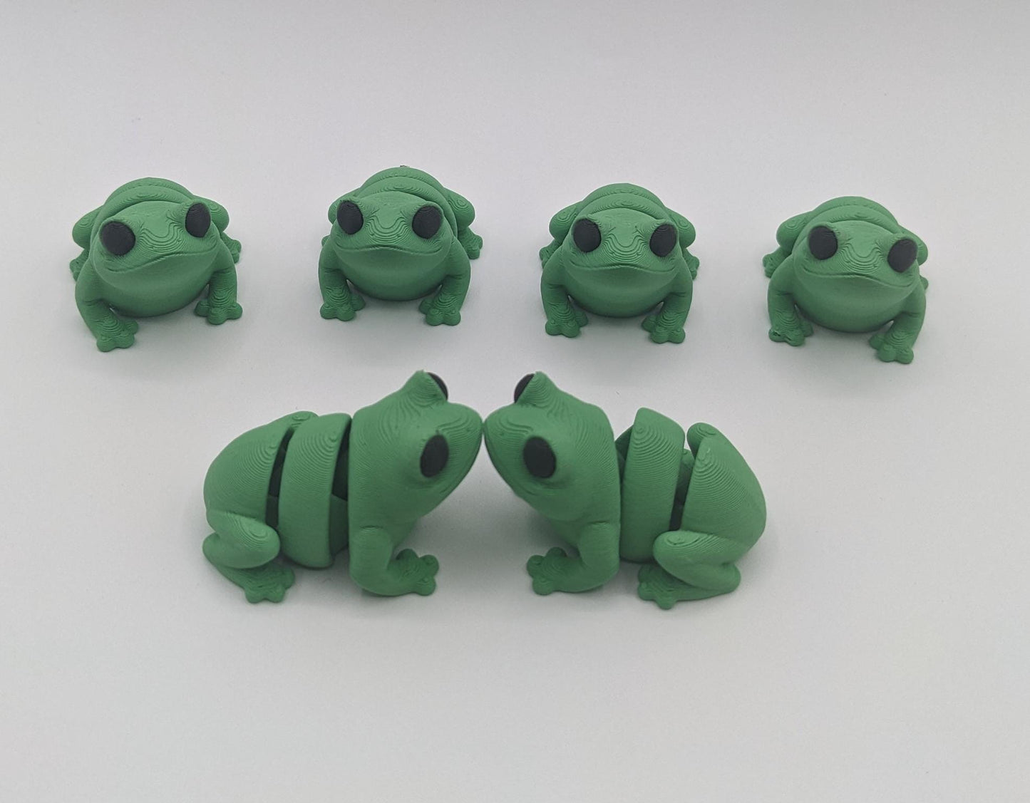 Meet our adorable 3D printed  Tiny Sensory Articulated Fidget Frog– your pocket-sized companion for stress relief and endless fun! Crafted with precision, this tiny articulated frog is more than just a toy; it's a delightful escape from the daily hustle. Feel the smooth texture and enjoy the satisfying tactile experience whenever you need a moment of calm.