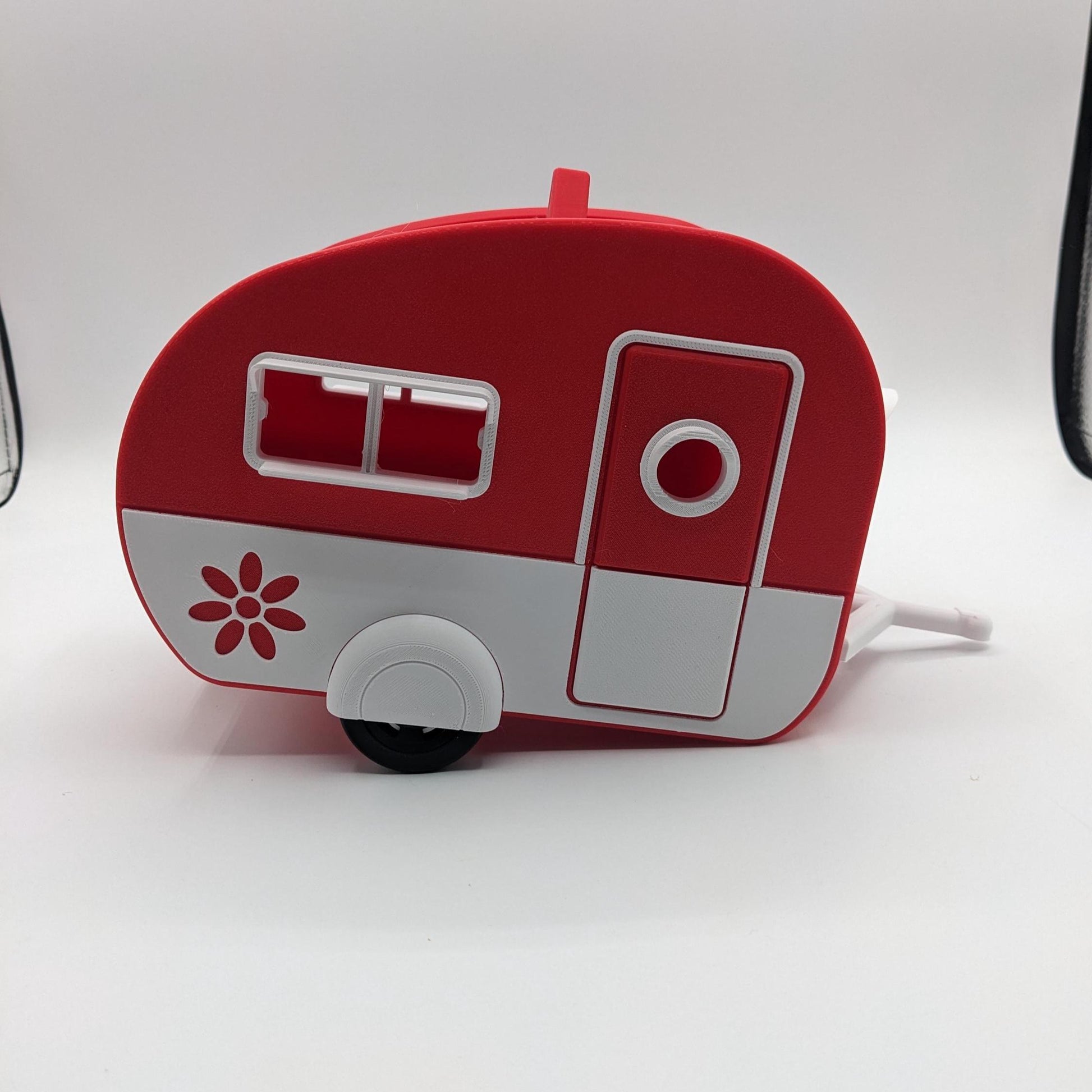 Turn your backyard into a bird lover’s paradise with the Retro RV Caravan Birdhouse! This charming and unique 3D-printed birdhouse is designed to look like a retro camper, bringing a touch of nostalgia and whimsy to your outdoor space. Perfect for bird enthusiasts, RV lovers, or anyone who adores fun and creative decor, this birdhouse is both functional and stylish.