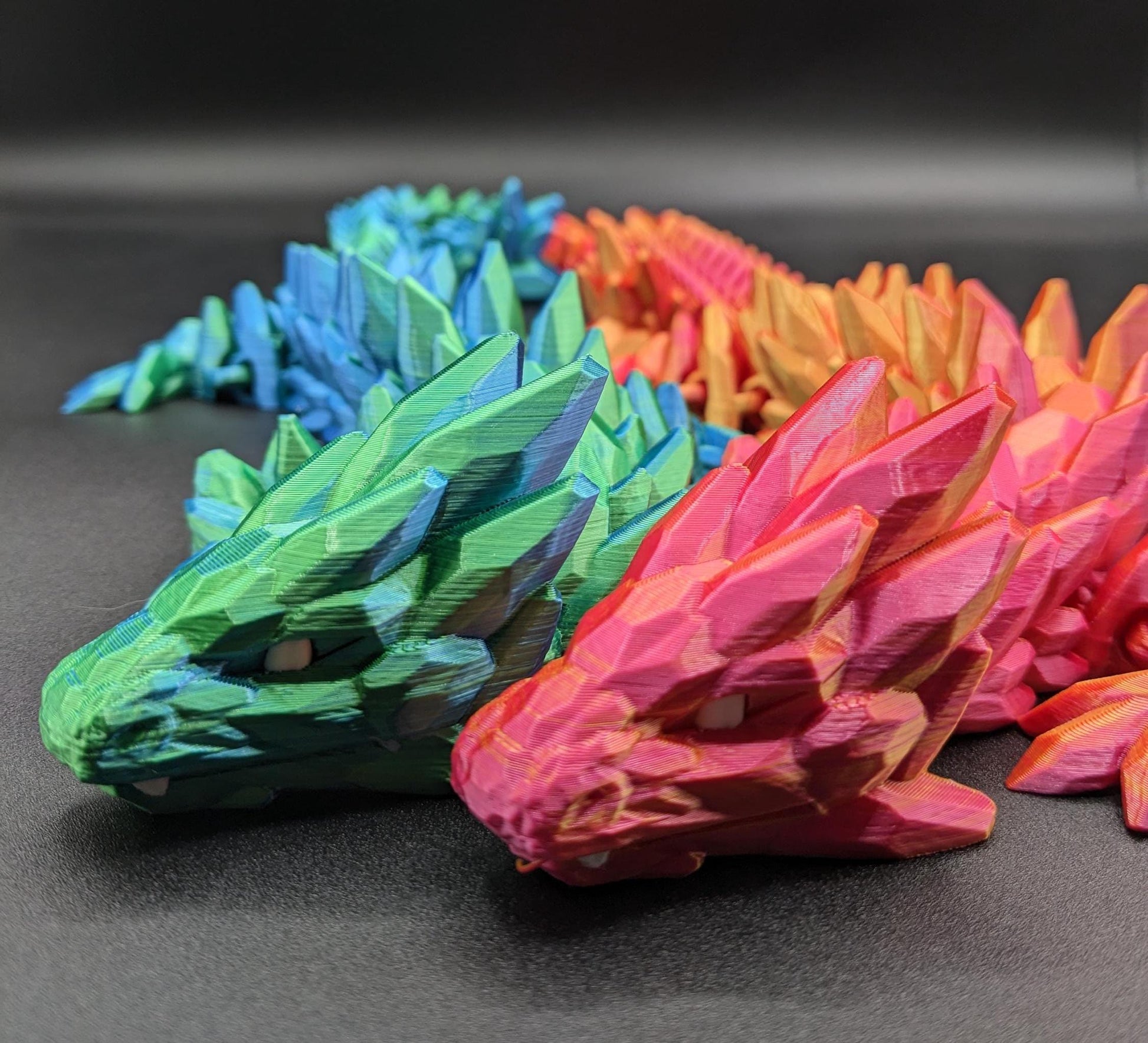 Our Beautiful Large Articulating Gemstone Dragon, combines the mystique of dragons with the elegance of gemstones is perfect for collectors, fantasy enthusiasts, and anyone looking to add a touch of magic to their home or office.