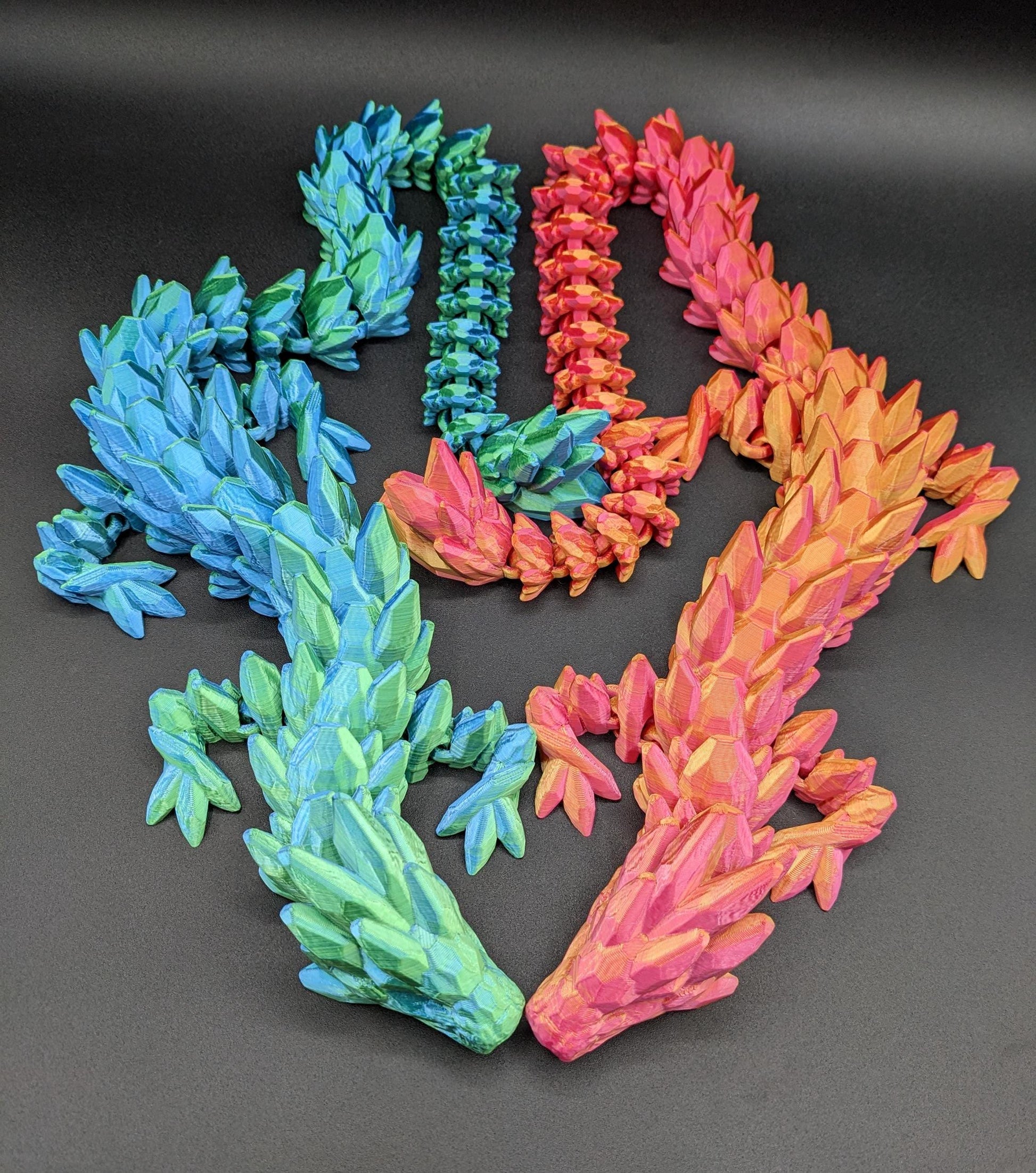 Our Beautiful Large Articulating Gemstone Dragon, combines the mystique of dragons with the elegance of gemstones is perfect for collectors, fantasy enthusiasts, and anyone looking to add a touch of magic to their home or office.