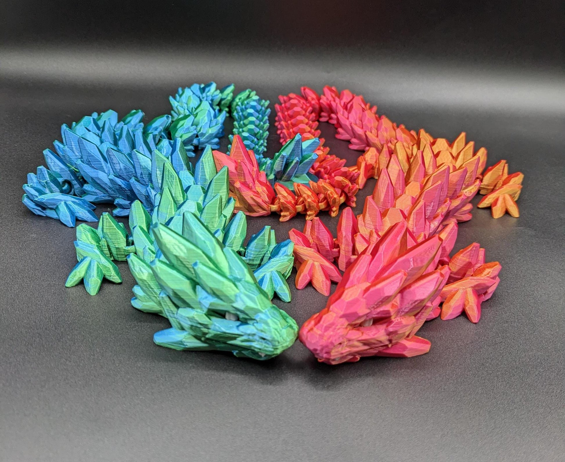 Our Beautiful Large Articulating Gemstone Dragon, combines the mystique of dragons with the elegance of gemstones is perfect for collectors, fantasy enthusiasts, and anyone looking to add a touch of magic to their home or office.