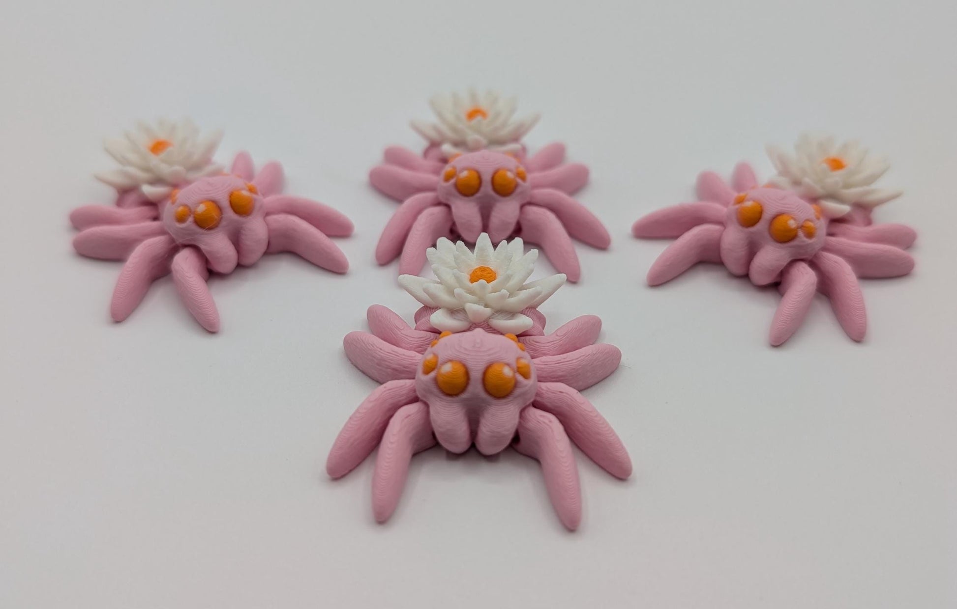 Introducing our Beautiful Articulating Water Lily Spider, a stunning blend of nature and art. Perfect for collectors and decor enthusiasts, this unique spider adds a touch of grace and whimsy to any space.