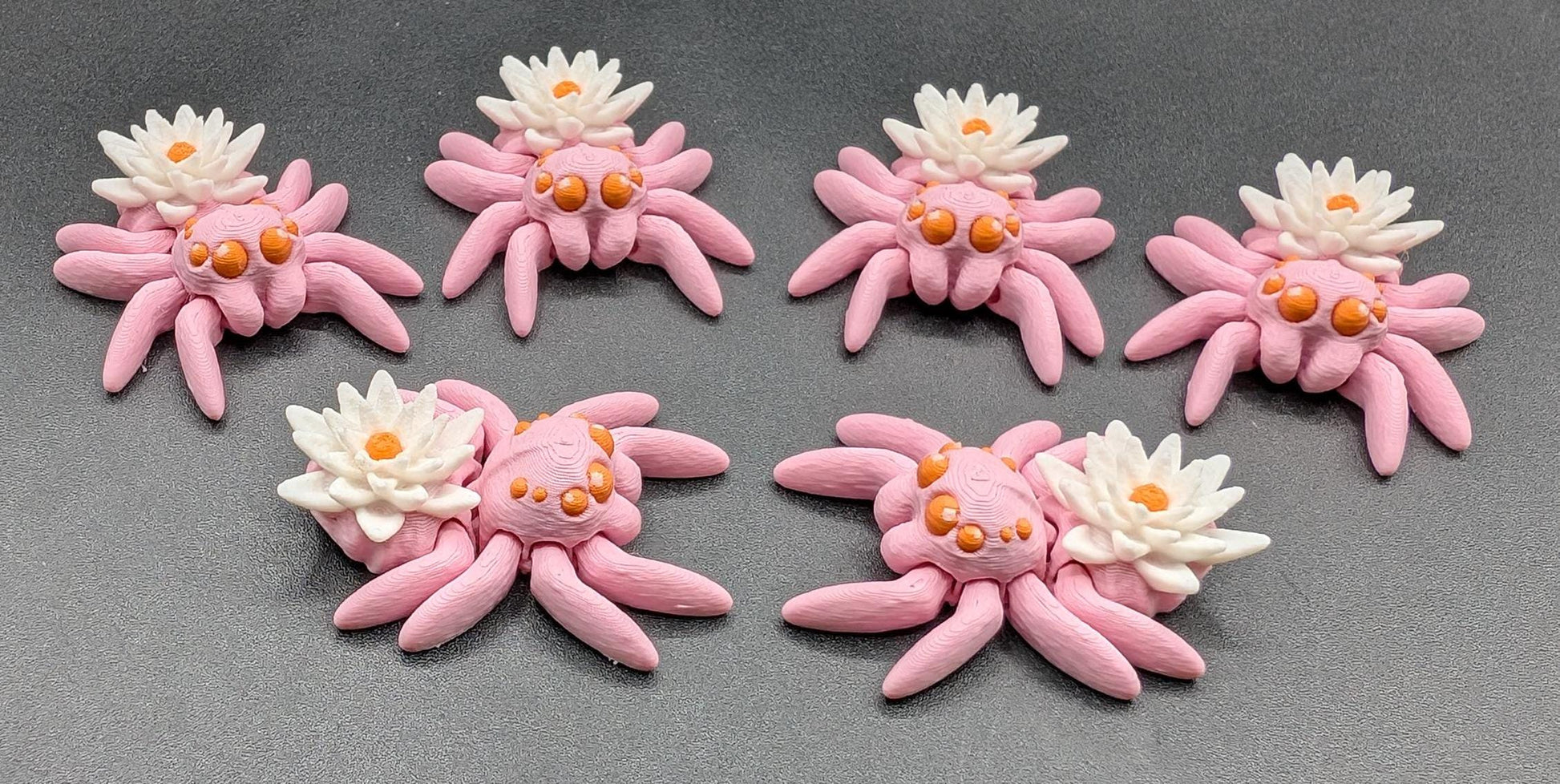 Introducing our Beautiful Articulating Water Lily Spider, a stunning blend of nature and art. Perfect for collectors and decor enthusiasts, this unique spider adds a touch of grace and whimsy to any space.