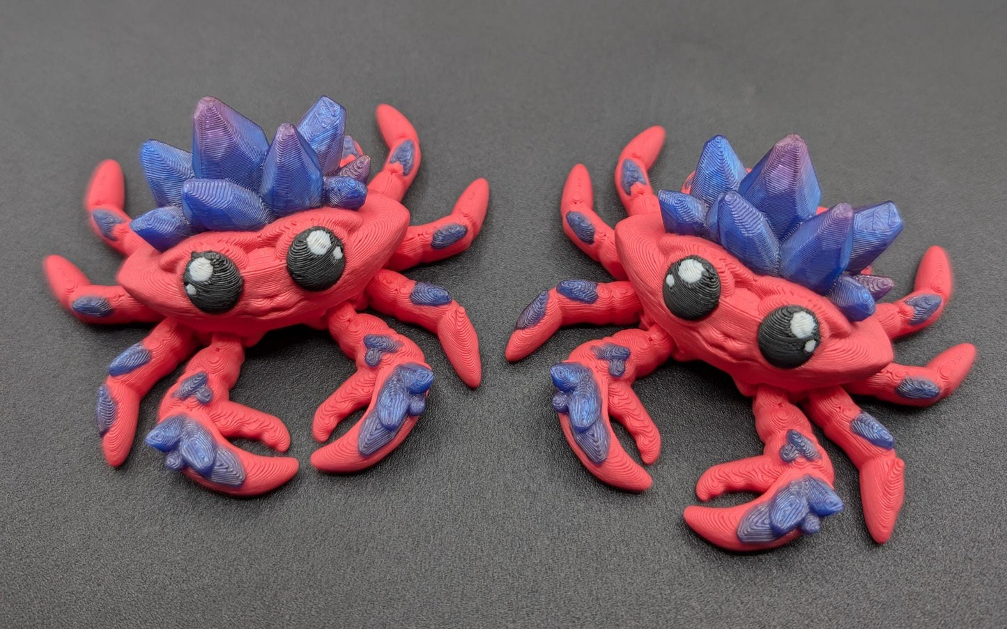 Introducing our Articulated Crystal Gemstone Crab Fidget Toy, a captivating blend of beauty and stress relief. Perfect for fidget enthusiasts and ocean lovers, this charming crab offers a unique way to unwind.