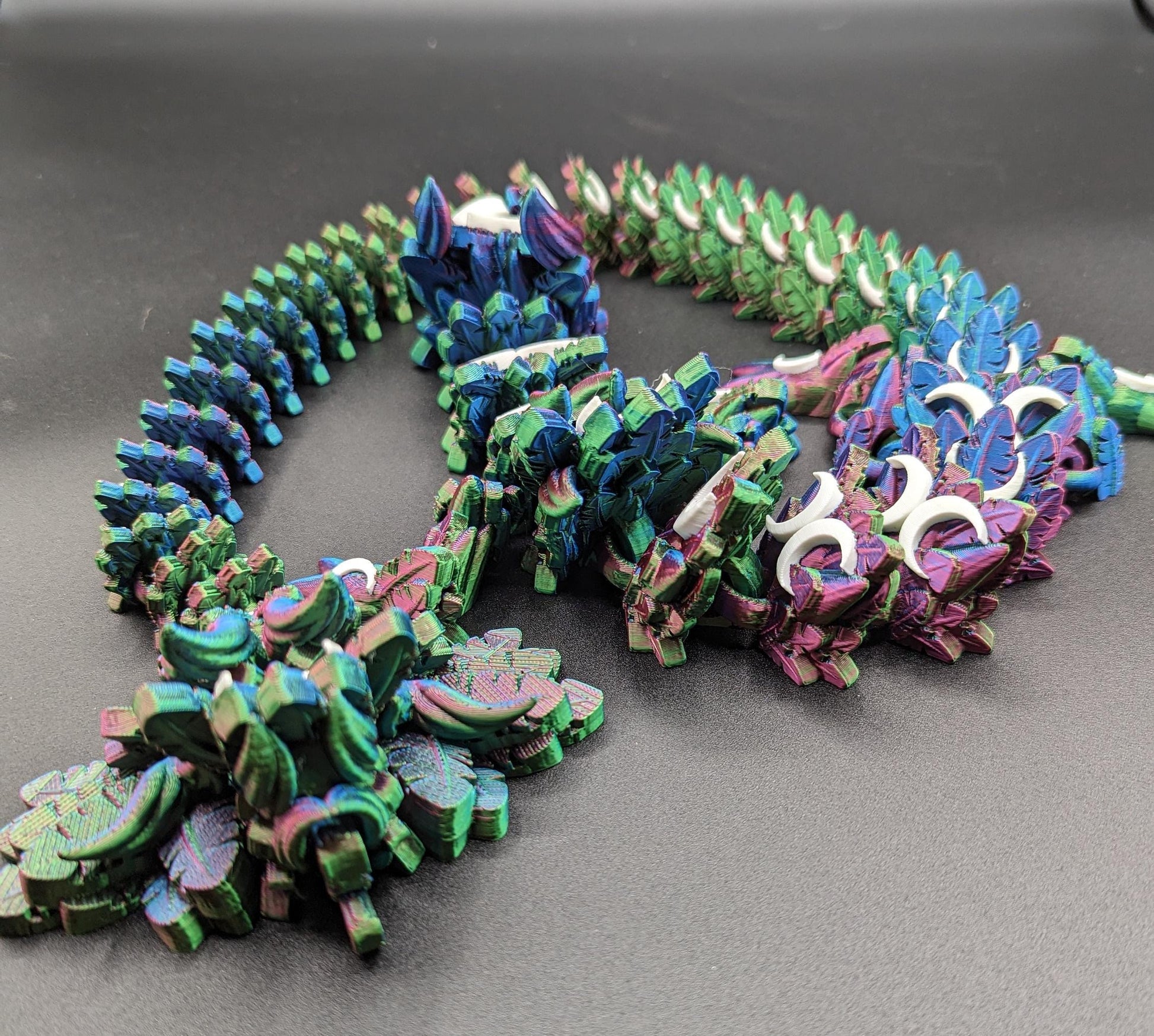 Introducing our Mystical Lunar Dragon, a captivating piece perfect for fantasy lovers and collectors alike. This ethereal dragon is designed to add a touch of magic and wonder to any space.