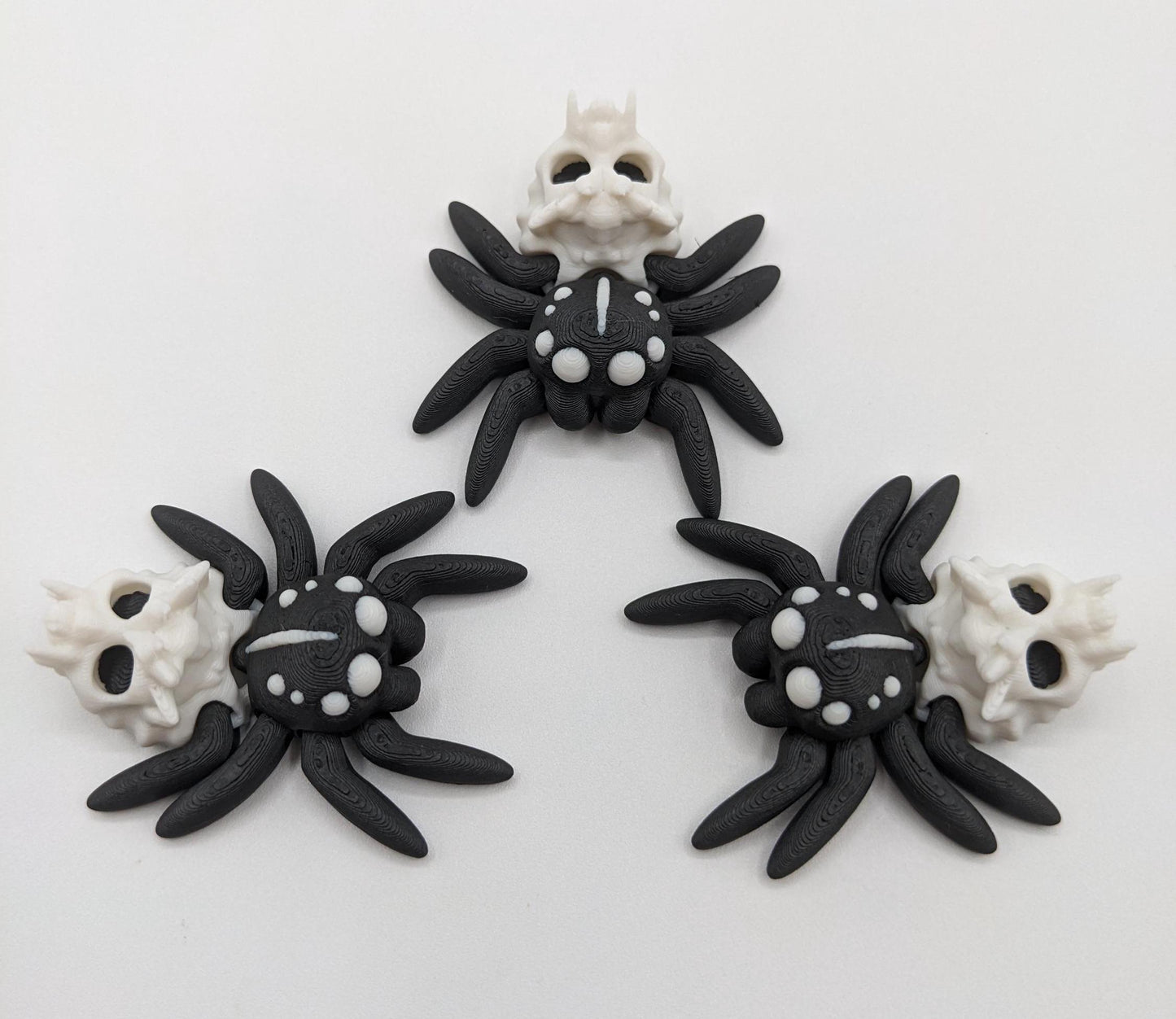 Introducing our Spooky Halloween Skull Spider Fidget Toy, a unique blend of eerie charm and stress relief. Perfect for Halloween enthusiasts and fidget fans, this spider toy offers a fun way to unwind and celebrate the season.