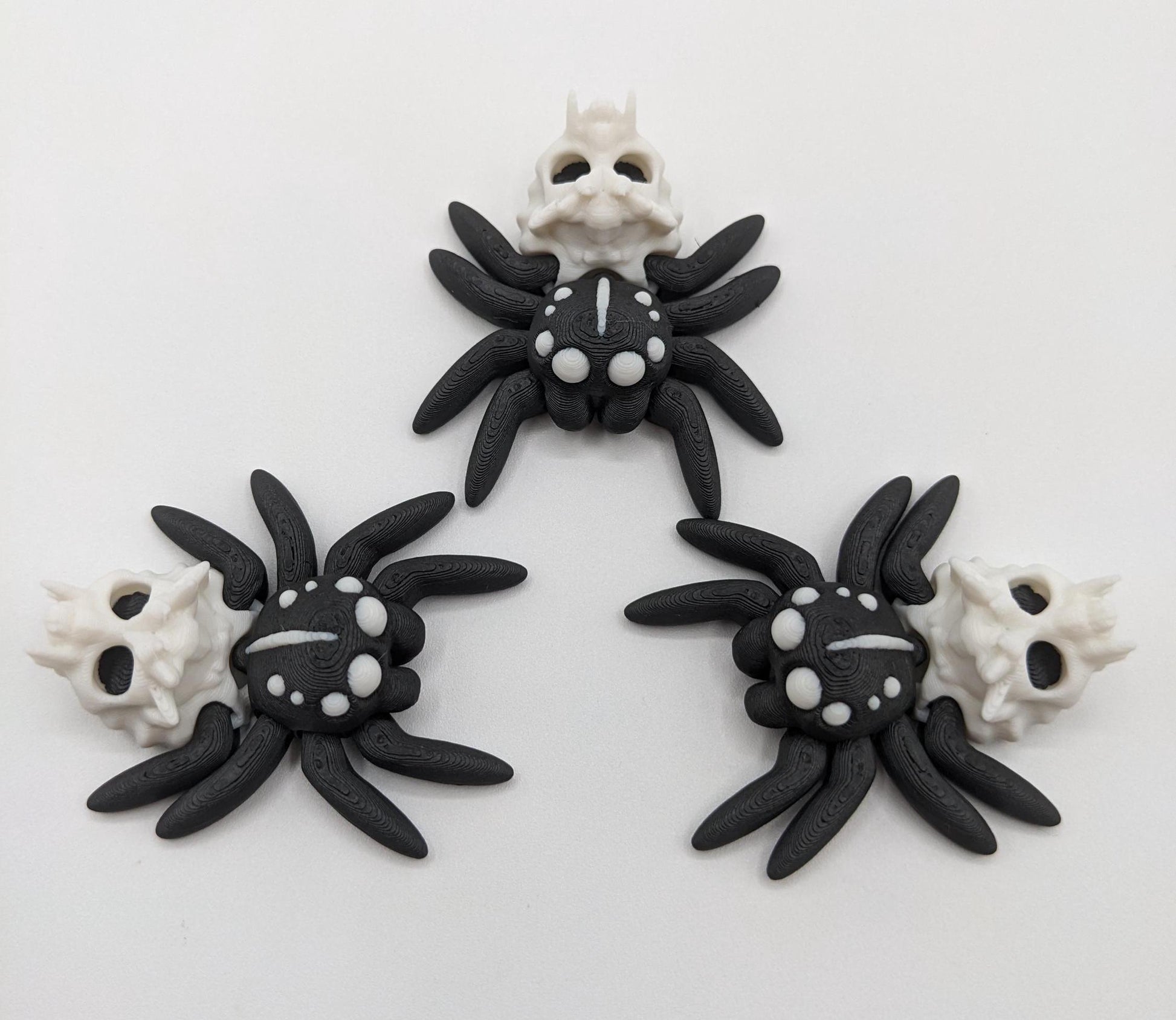 Introducing our Spooky Halloween Skull Spider Fidget Toy, a unique blend of eerie charm and stress relief. Perfect for Halloween enthusiasts and fidget fans, this spider toy offers a fun way to unwind and celebrate the season.