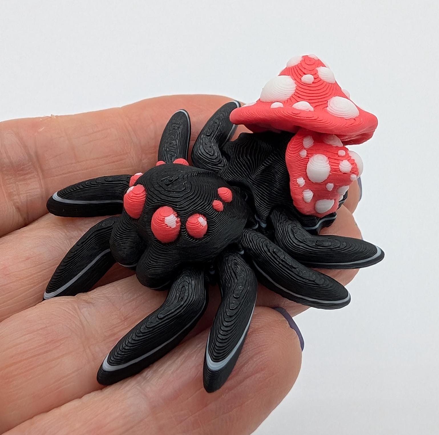 Introducing our Cute Articulated Mushroom Spider, a delightful fusion of nature and imagination. Perfect for anyone who loves unique decor, this charming spider is sure to bring a smile to your face.