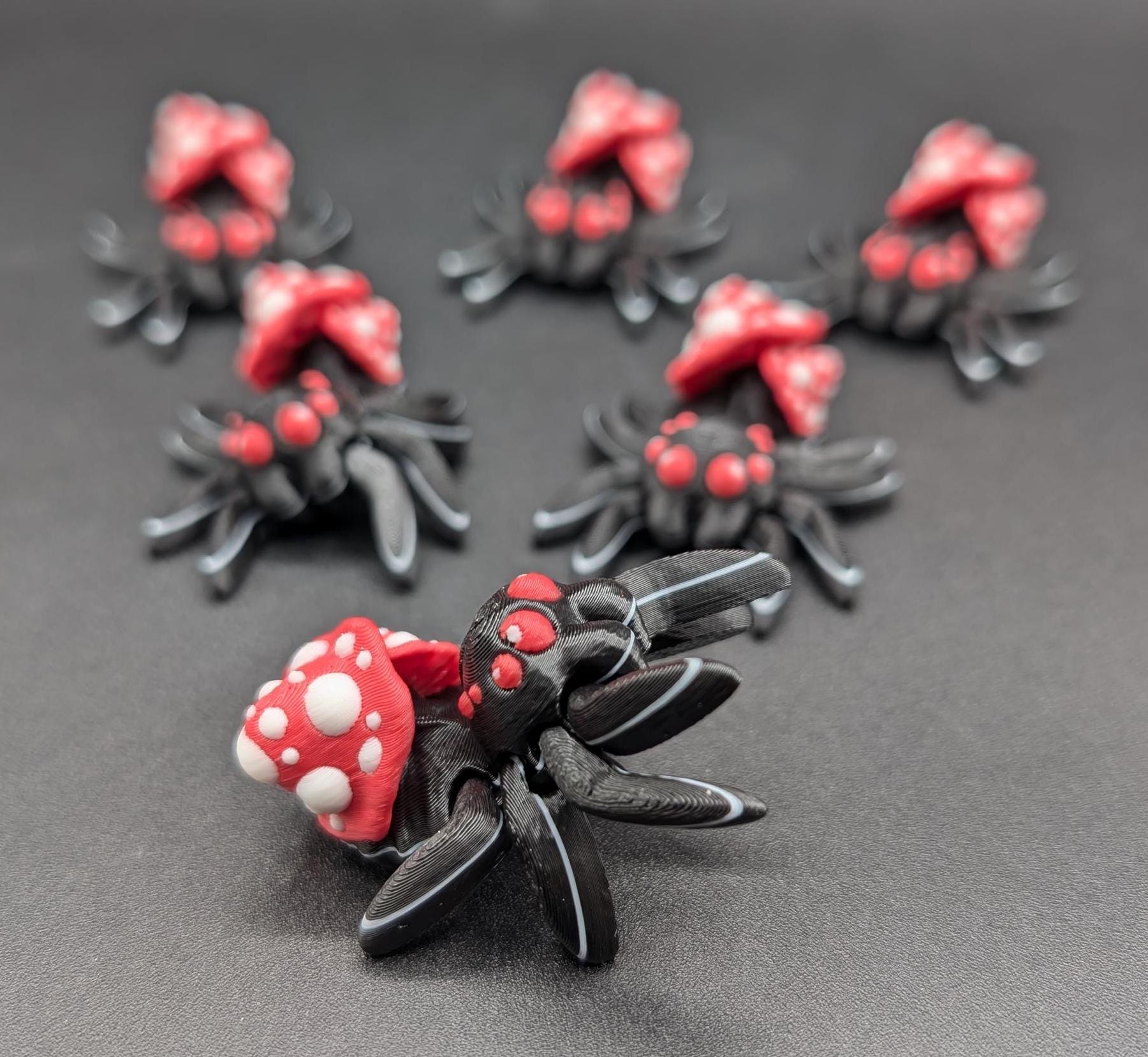 Introducing our Cute Articulated Mushroom Spider, a delightful fusion of nature and imagination. Perfect for anyone who loves unique decor, this charming spider is sure to bring a smile to your face.