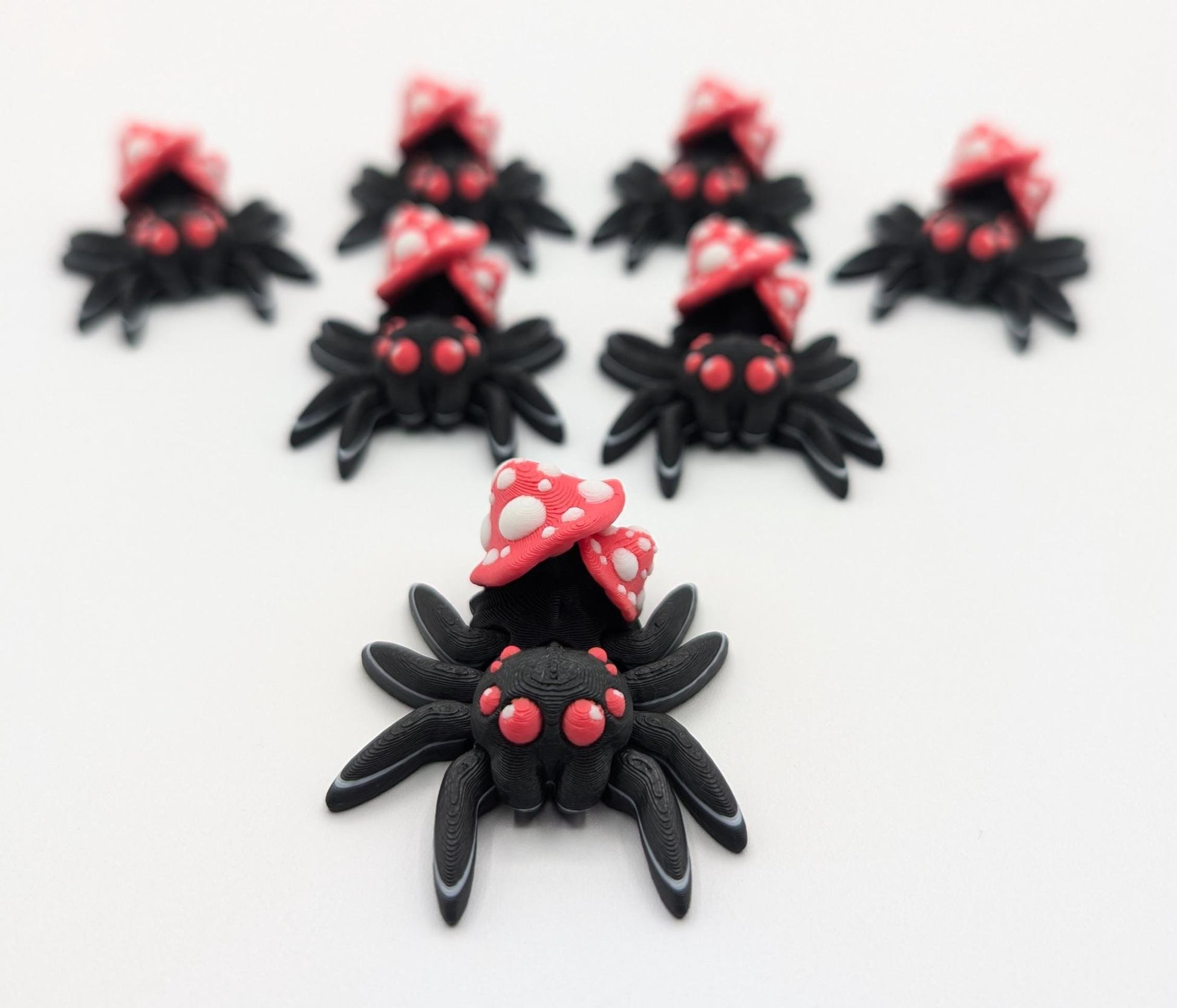Introducing our Cute Articulated Mushroom Spider, a delightful fusion of nature and imagination. Perfect for anyone who loves unique decor, this charming spider is sure to bring a smile to your face.