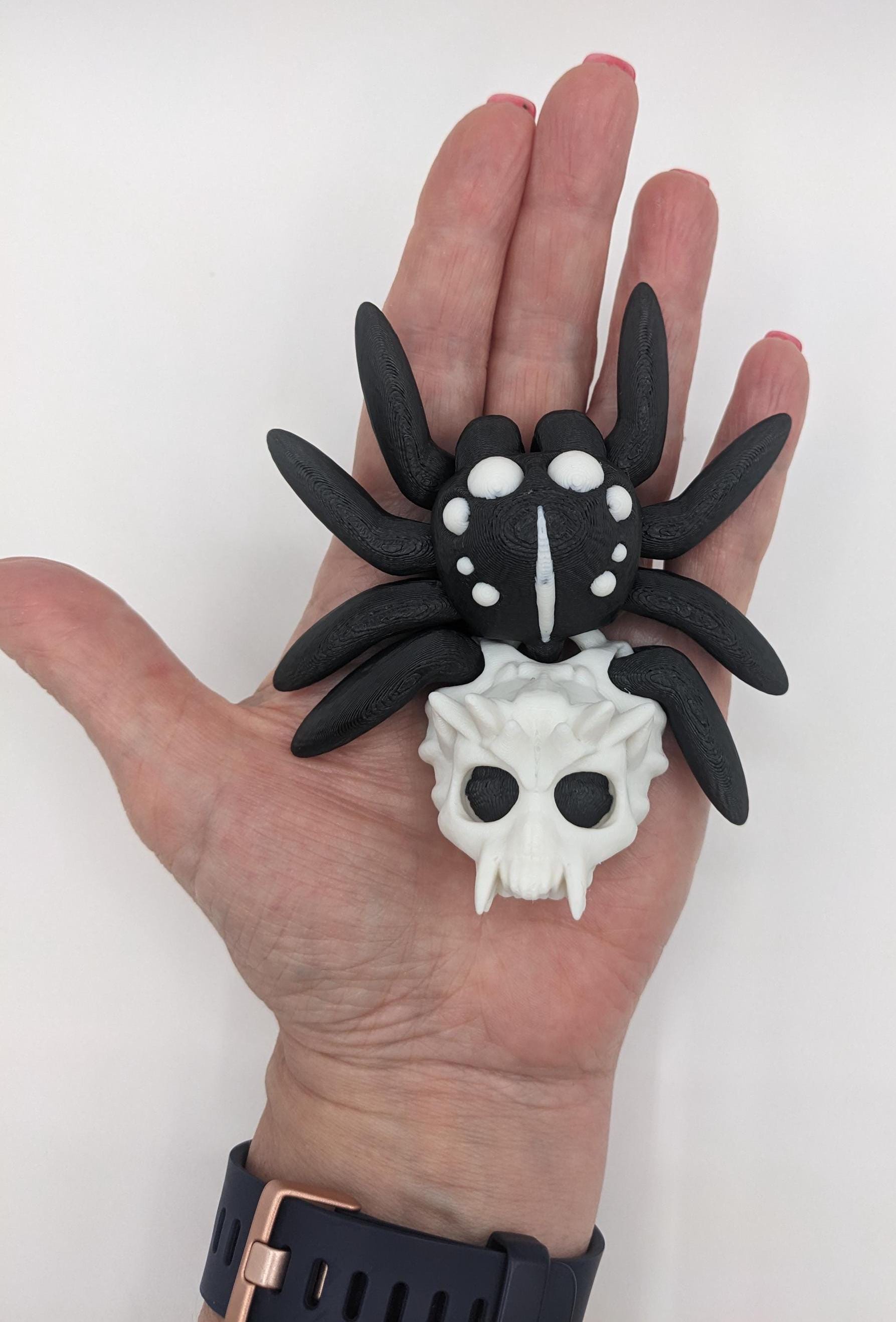 Introducing our Spooky Halloween Skull Spider Fidget Toy, a unique blend of eerie charm and stress relief. Perfect for Halloween enthusiasts and fidget fans, this spider toy offers a fun way to unwind and celebrate the season.
