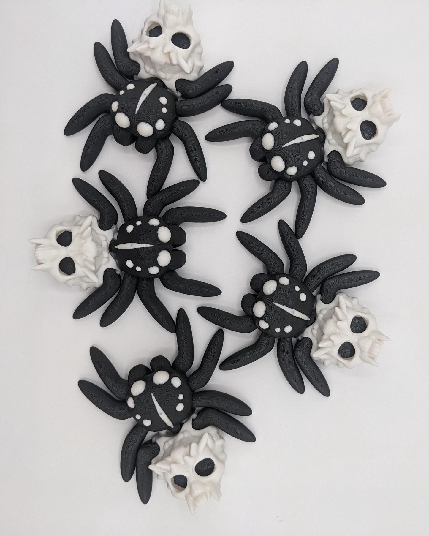 Introducing our Spooky Halloween Skull Spider Fidget Toy, a unique blend of eerie charm and stress relief. Perfect for Halloween enthusiasts and fidget fans, this spider toy offers a fun way to unwind and celebrate the season.