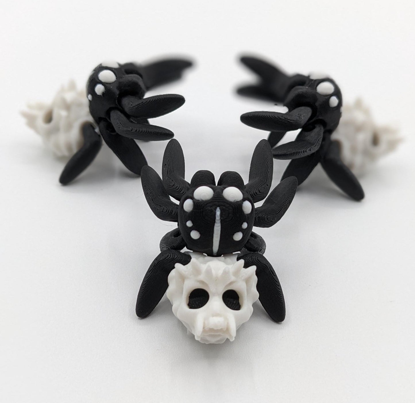 Introducing our Spooky Halloween Skull Spider Fidget Toy, a unique blend of eerie charm and stress relief. Perfect for Halloween enthusiasts and fidget fans, this spider toy offers a fun way to unwind and celebrate the season.
