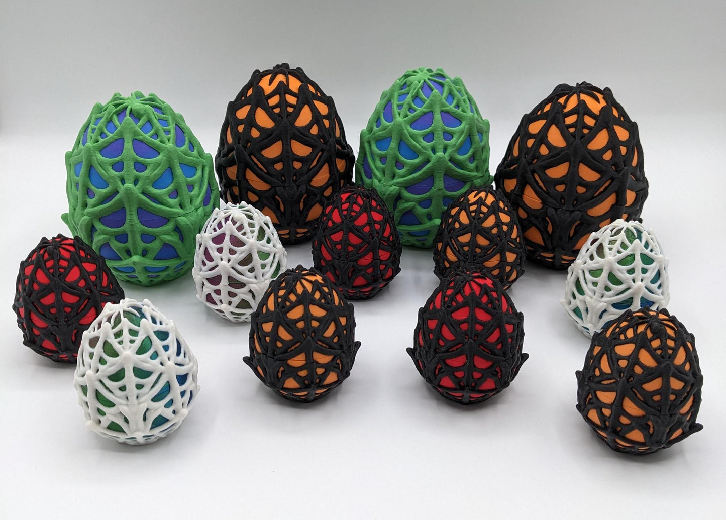 Our Spiderweb Egg with choice of spider captures the spooky fun of the season, a must-have for your festive collection. Perfect for adding a touch of mystery & fun to any room, this spiderweb egg combines intricate design with playful charm.